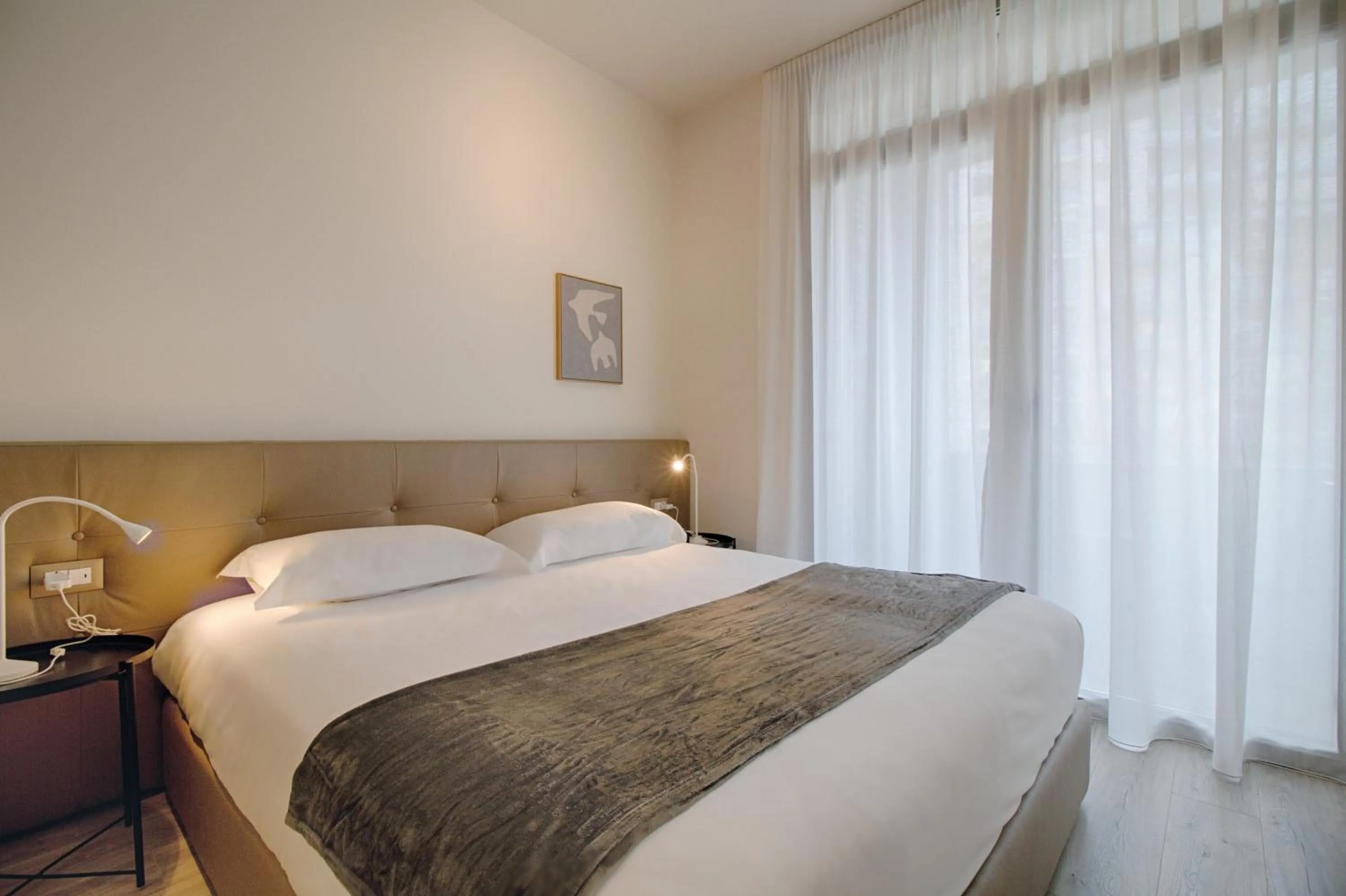 View (from property/room), Bed in The Rooms Serviced Apartments Tirana