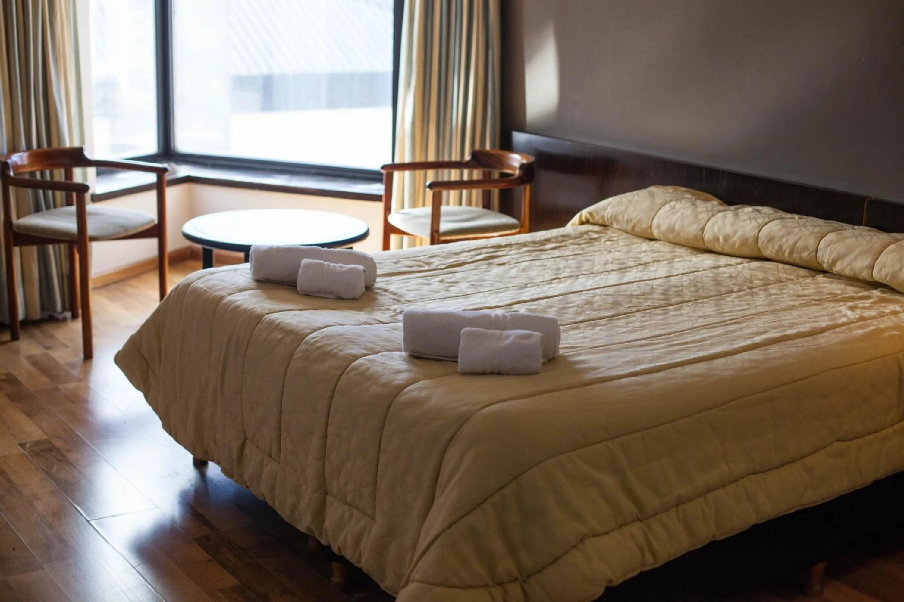 Photo of the whole room, Bed in HOTEL BARILOCHE CITY