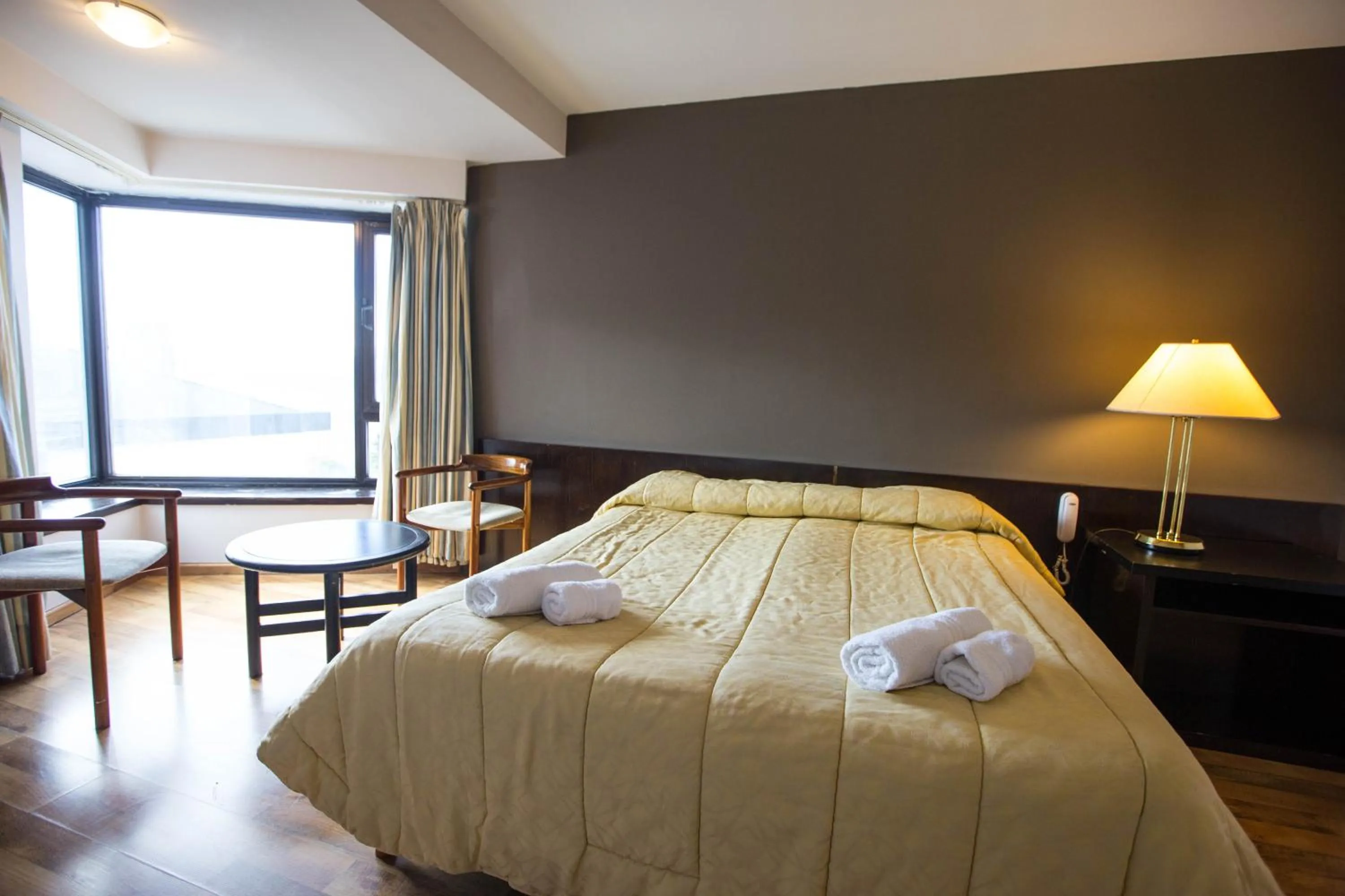 Photo of the whole room, Bed in HOTEL BARILOCHE CITY