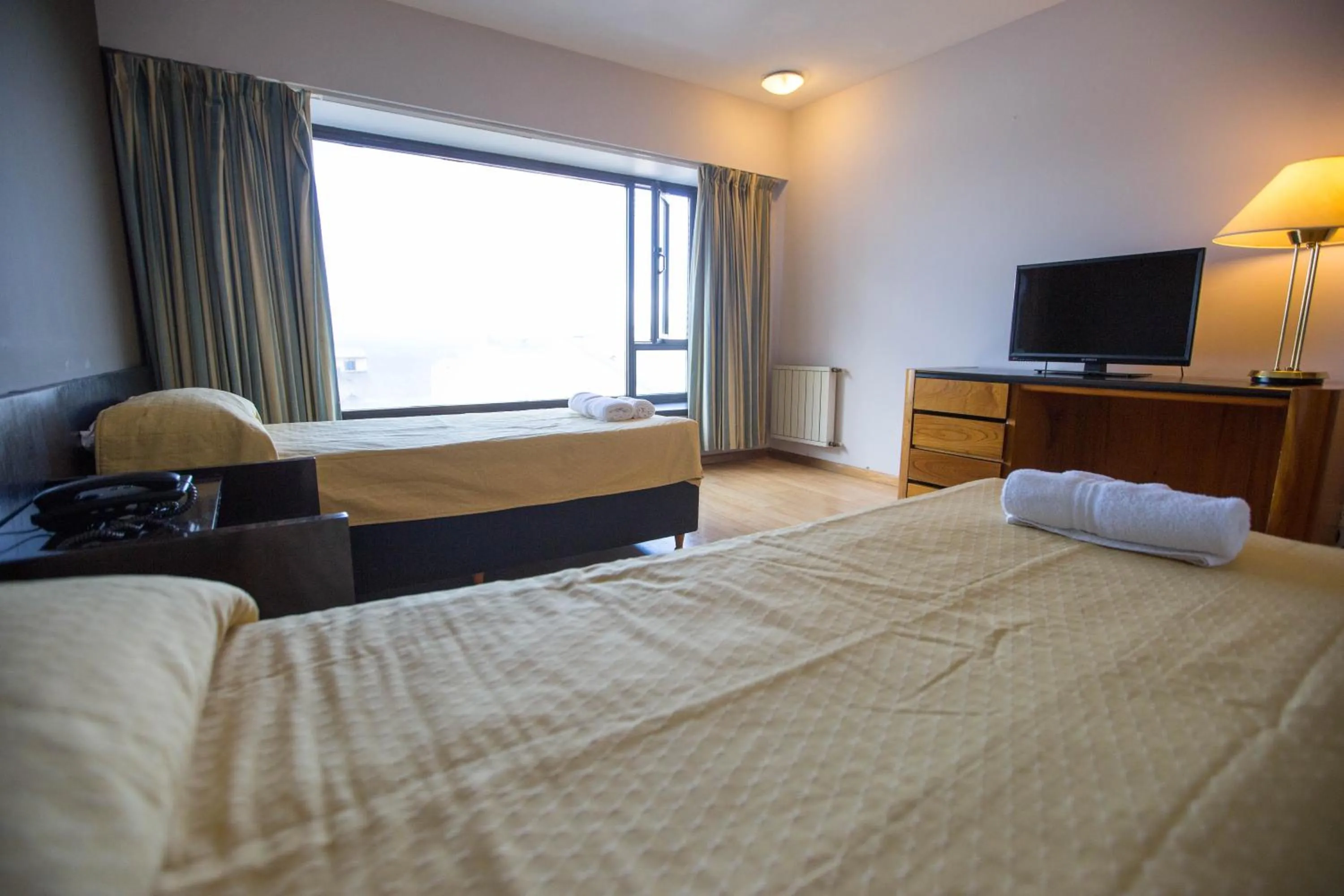 Photo of the whole room, Bed in HOTEL BARILOCHE CITY