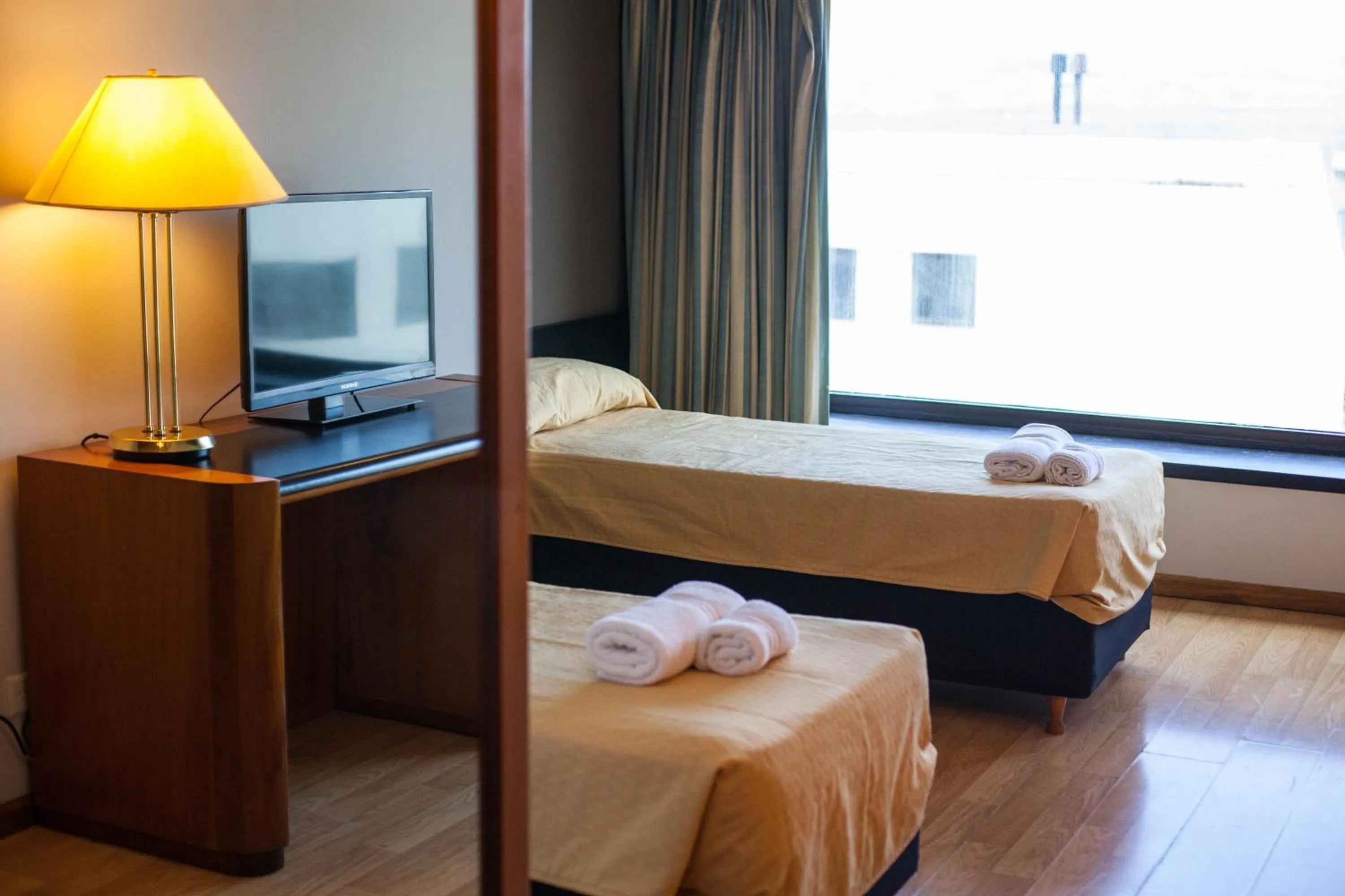 Photo of the whole room, Bed in HOTEL BARILOCHE CITY