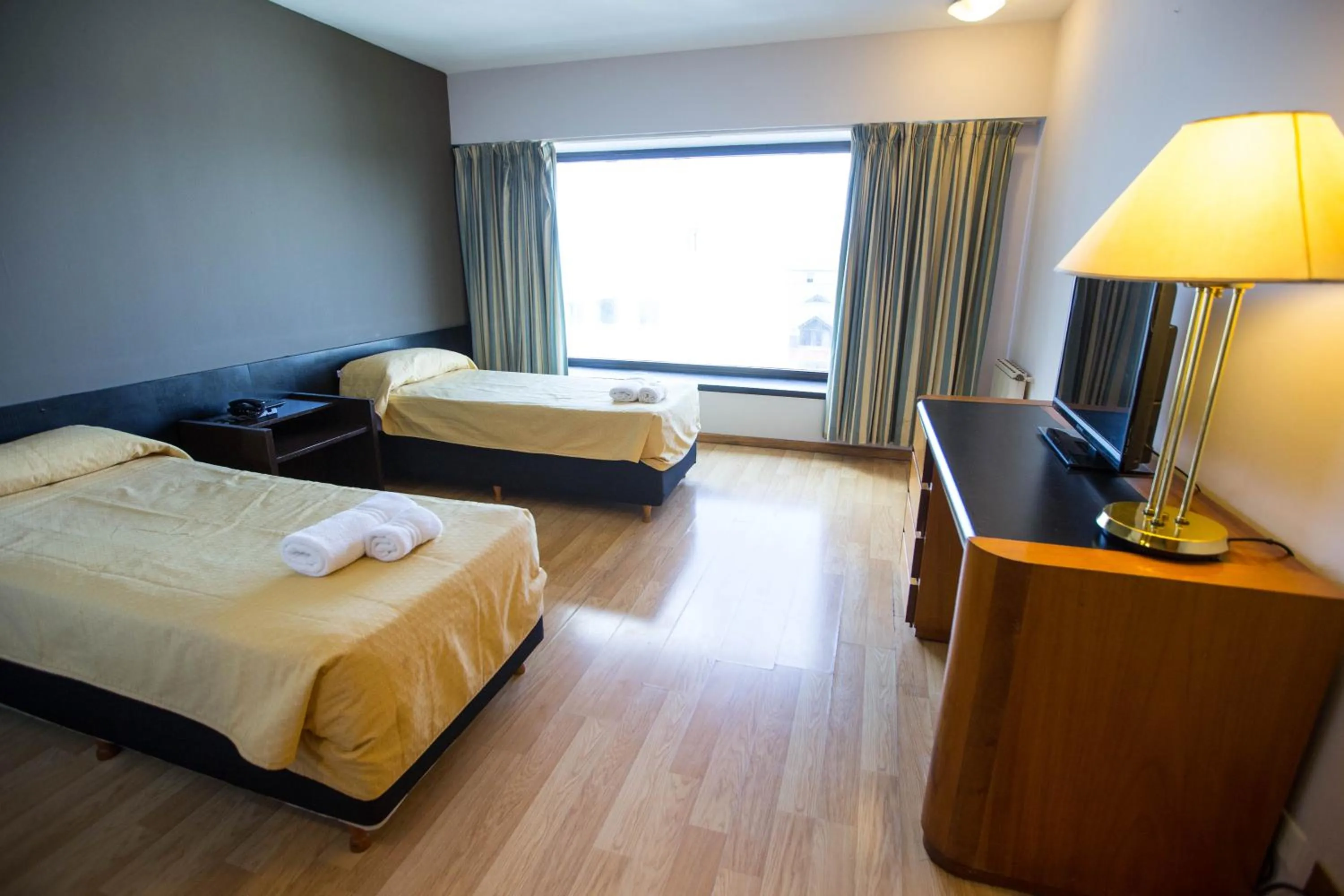 Photo of the whole room, Bed in HOTEL BARILOCHE CITY