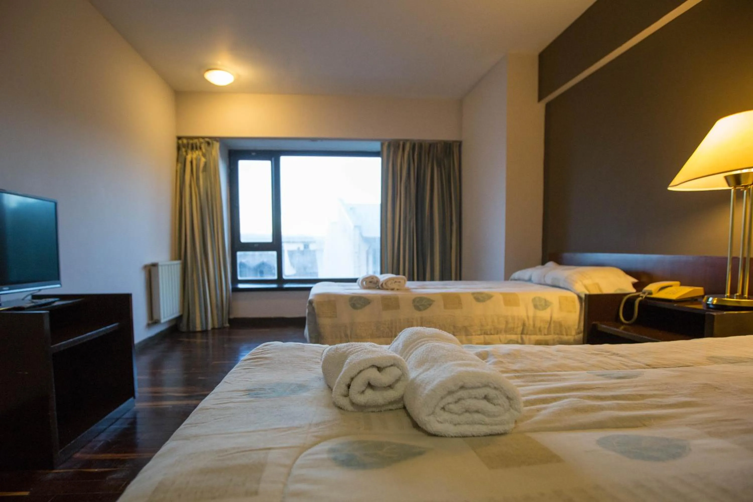 Photo of the whole room, Bed in HOTEL BARILOCHE CITY