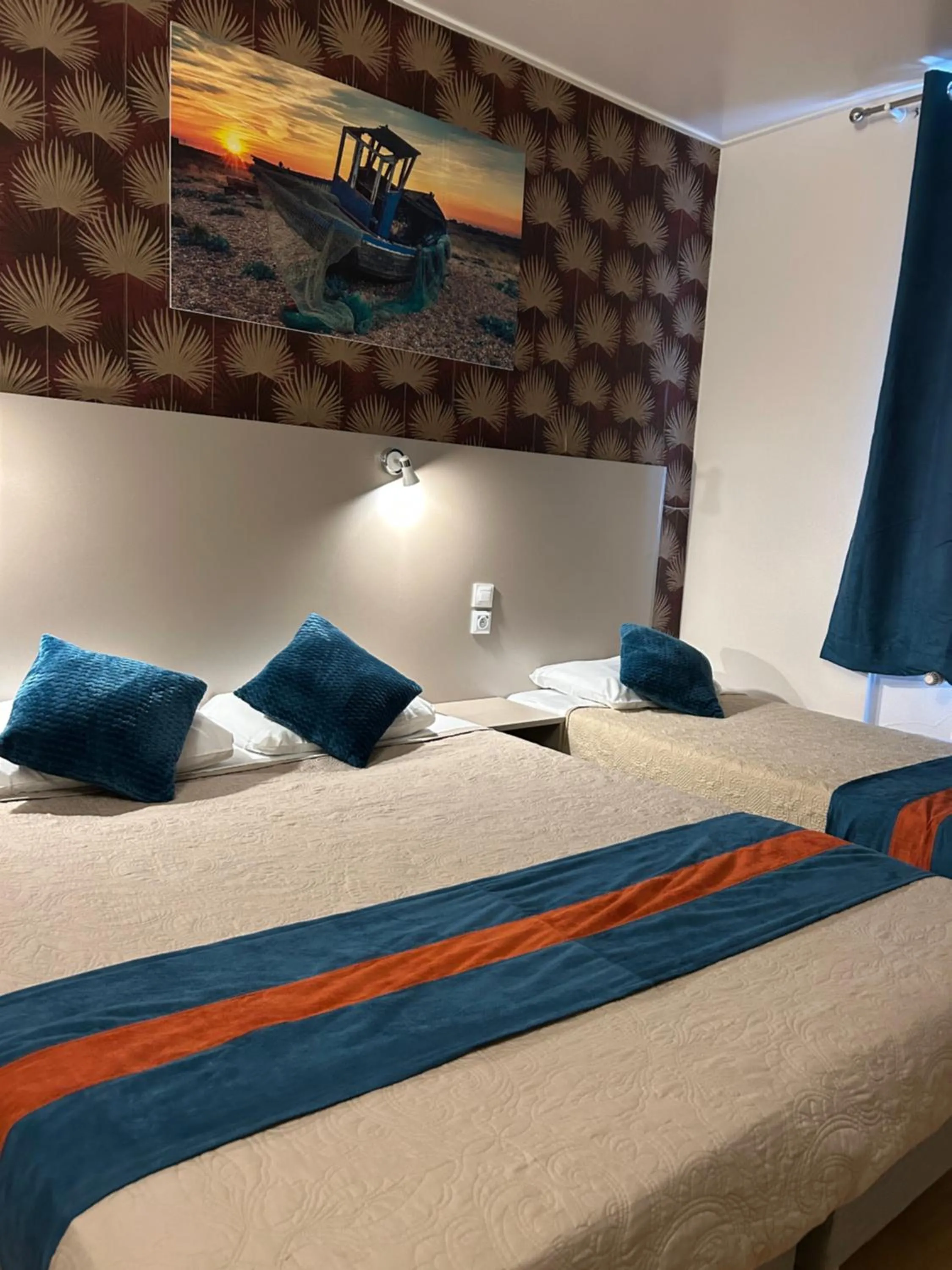 Bed in Hotel de Normandie