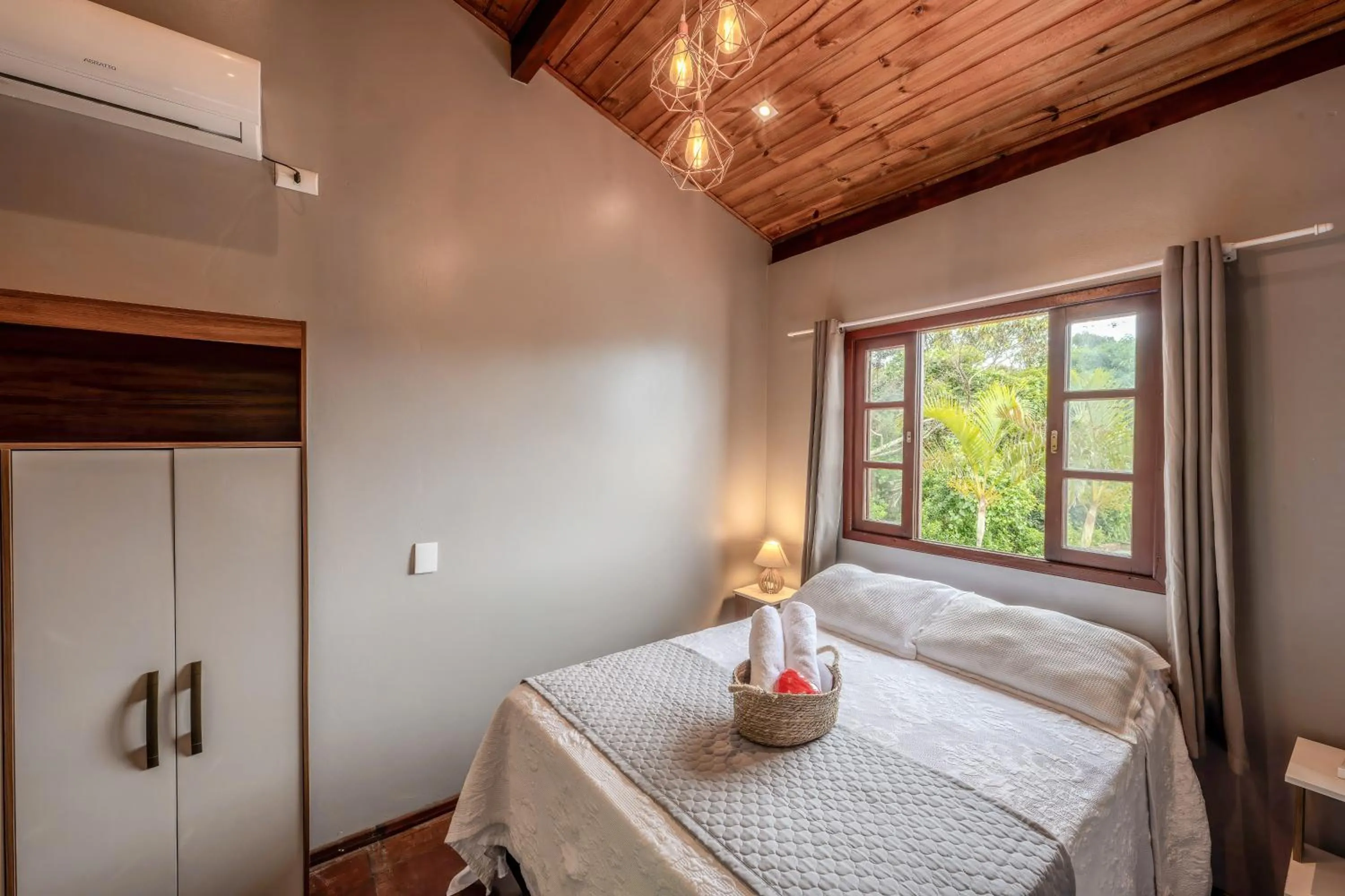 Bed in Pousada Natribus Rosa