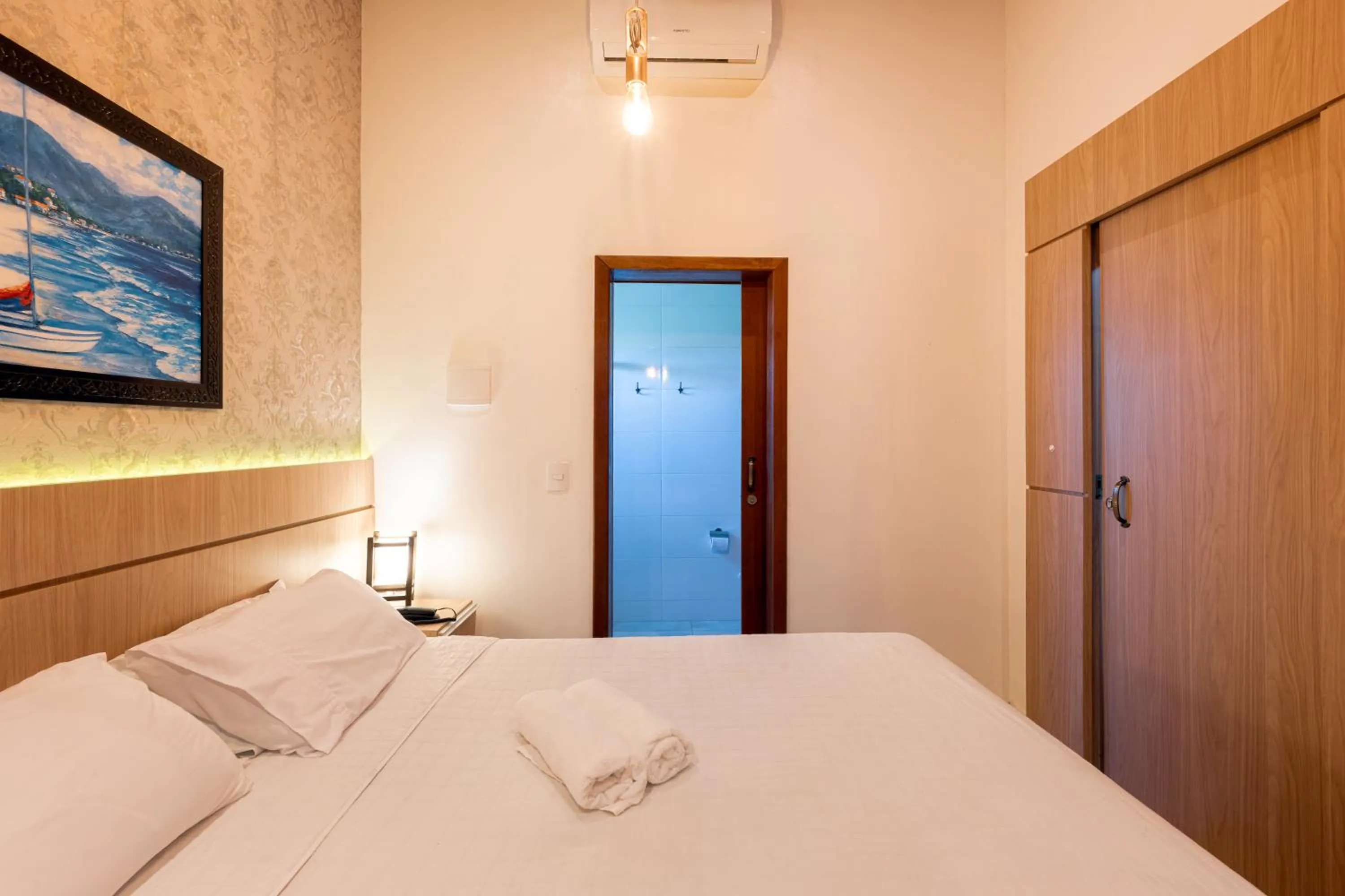 Bed in Pousada Natribus Rosa