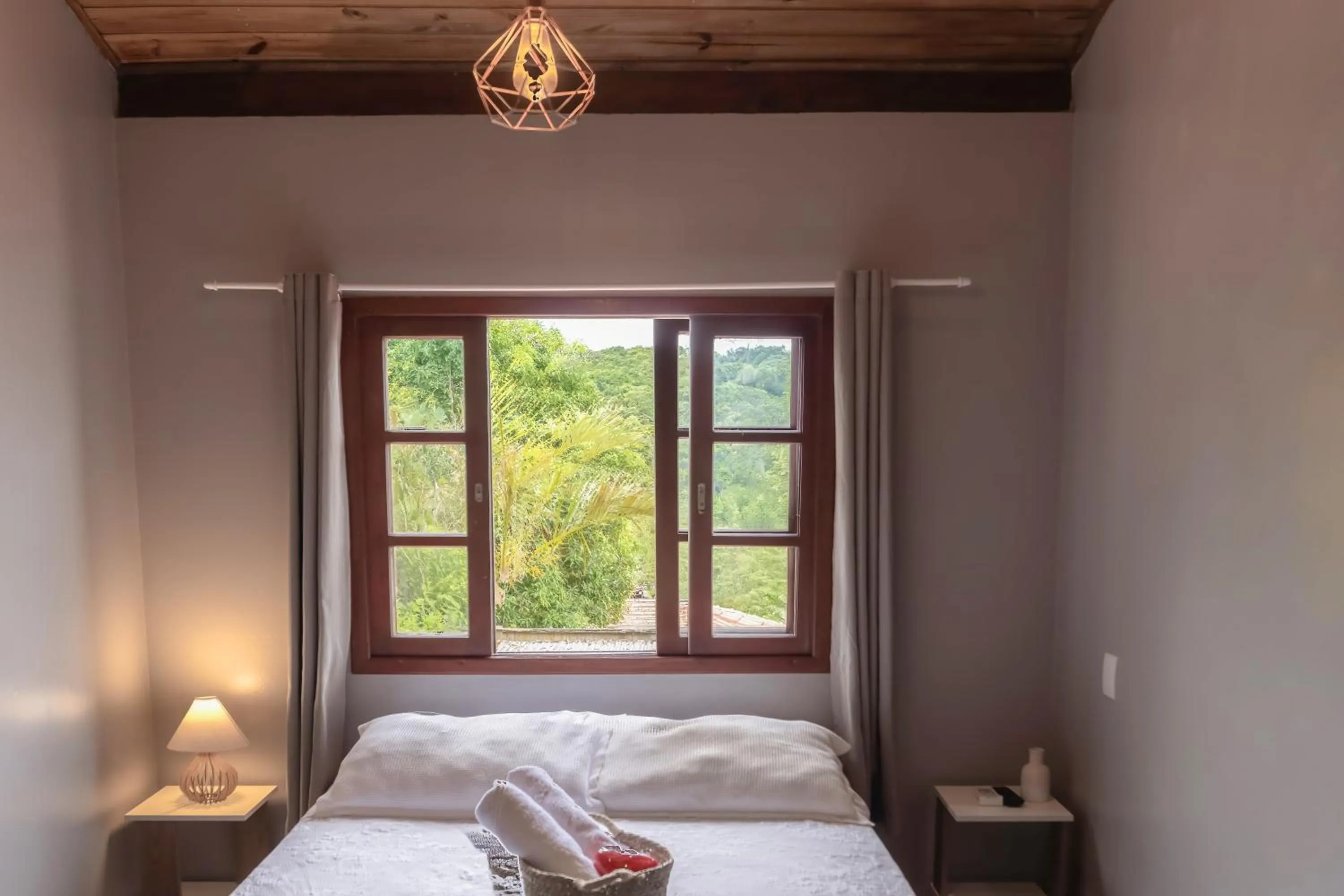 Bed in Pousada Natribus Rosa