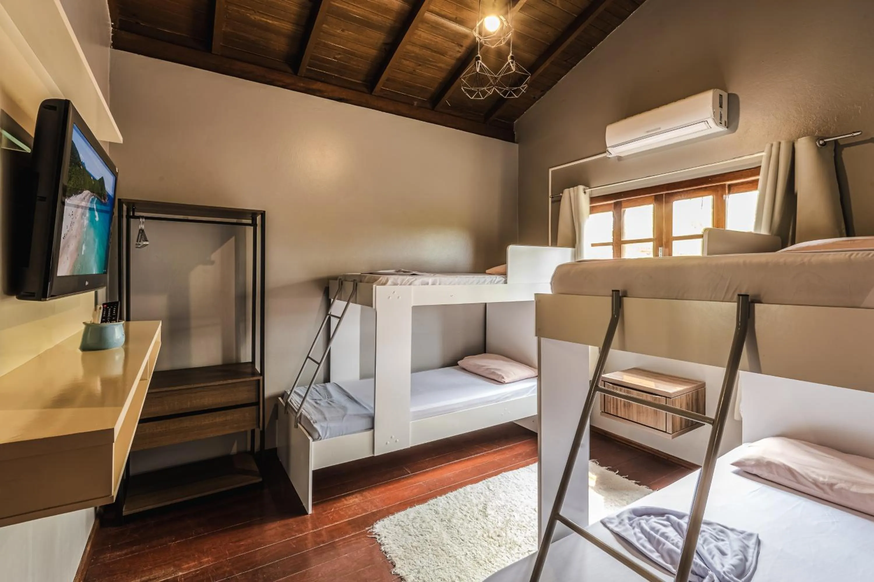 Bed in Pousada Natribus Rosa