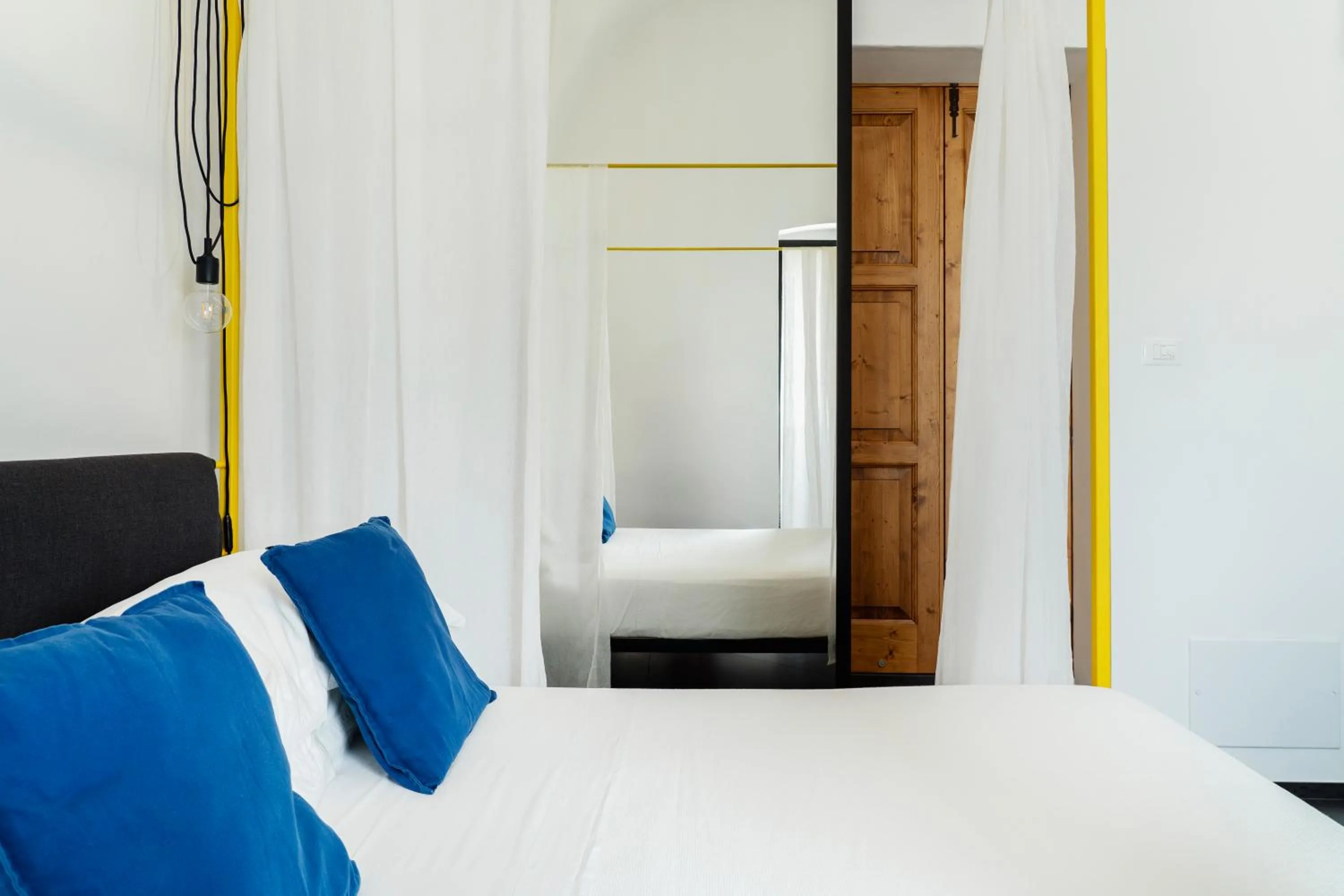 Bed in Palazzo Biancofiore, suites & rooftop Ostuni