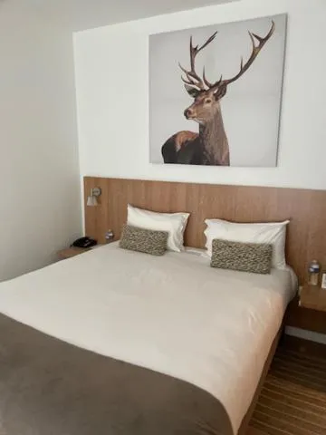 Bed in Logis des Sittelles