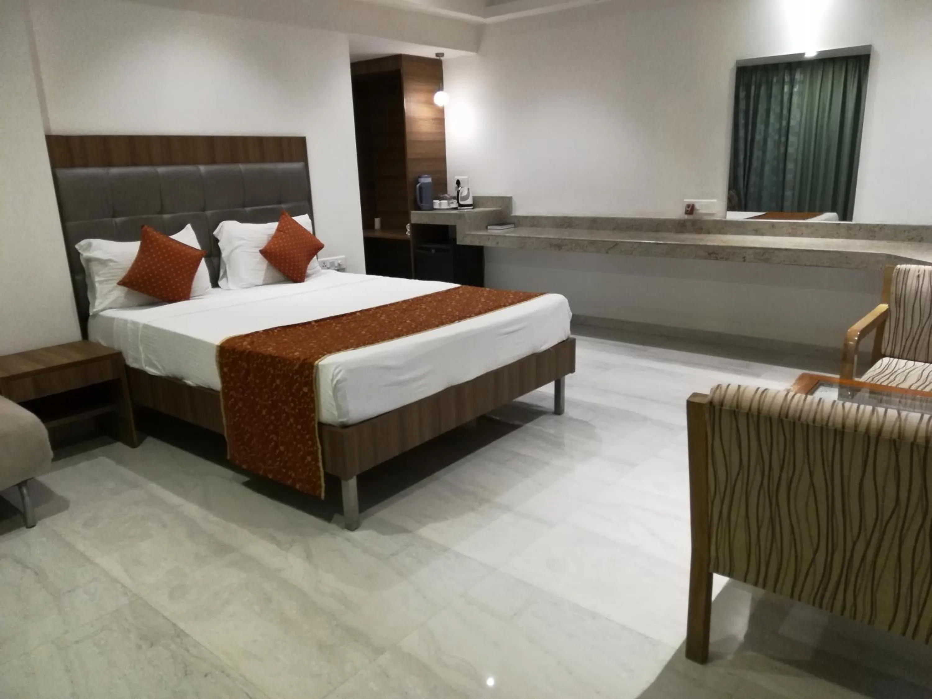 Bed in Lake View Resort Lonavala
