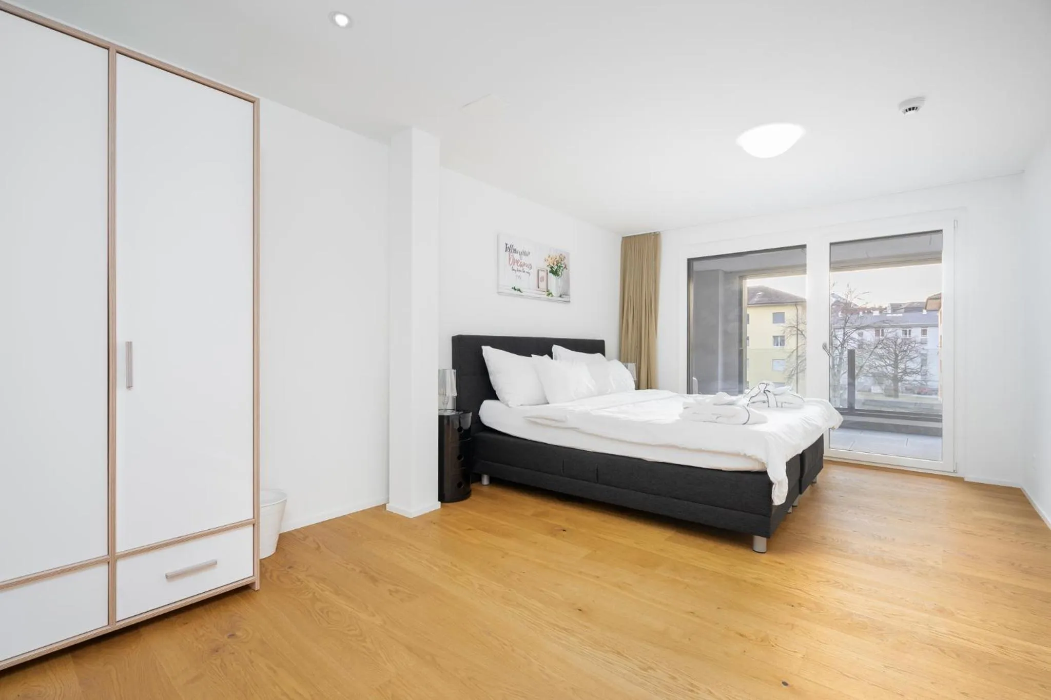 Bed in Swiss Hotel Apartments - Interlaken