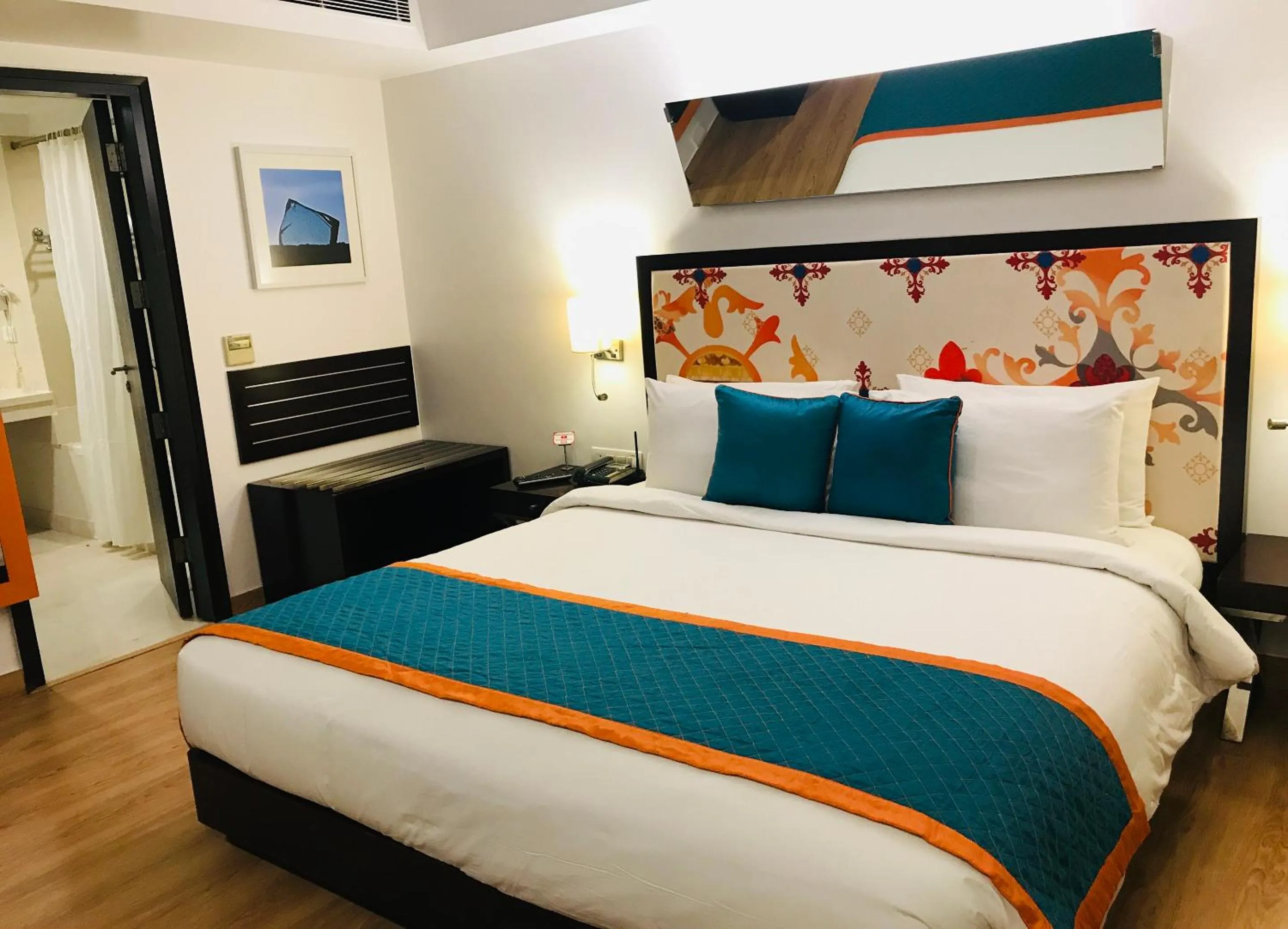 Bedroom, Bed in Golden Tulip City Centre Gurgaon