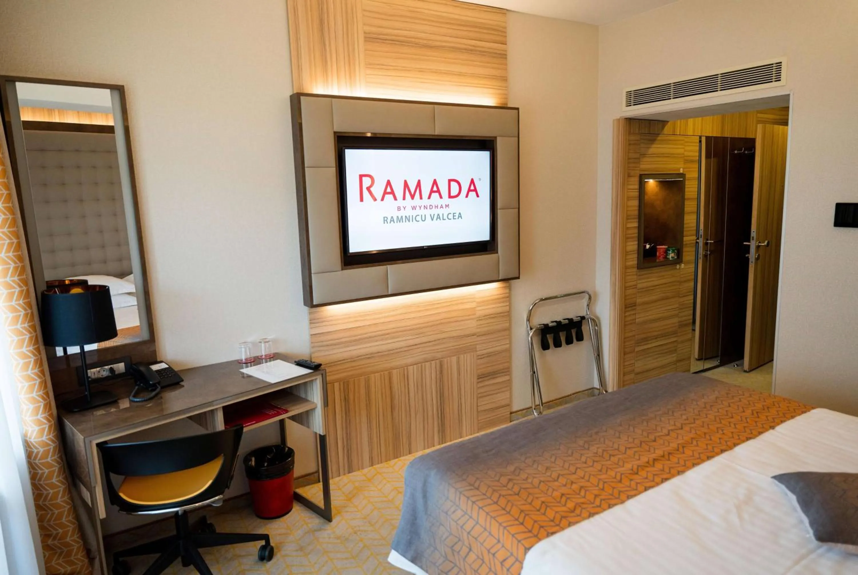 Photo of the whole room, Bed in Ramada by Wyndham Ramnicu Valcea