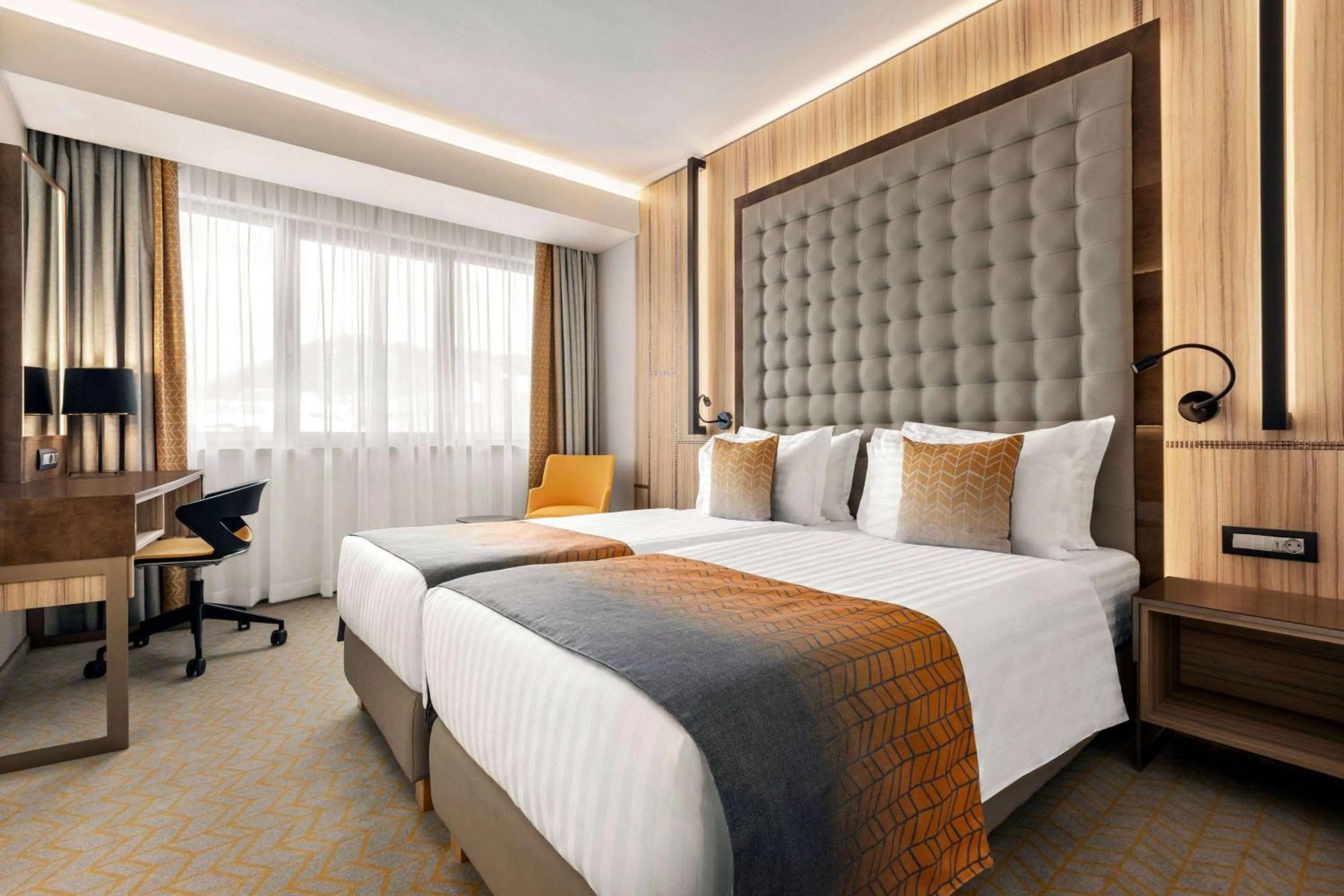 Photo of the whole room, Bed in Ramada by Wyndham Ramnicu Valcea