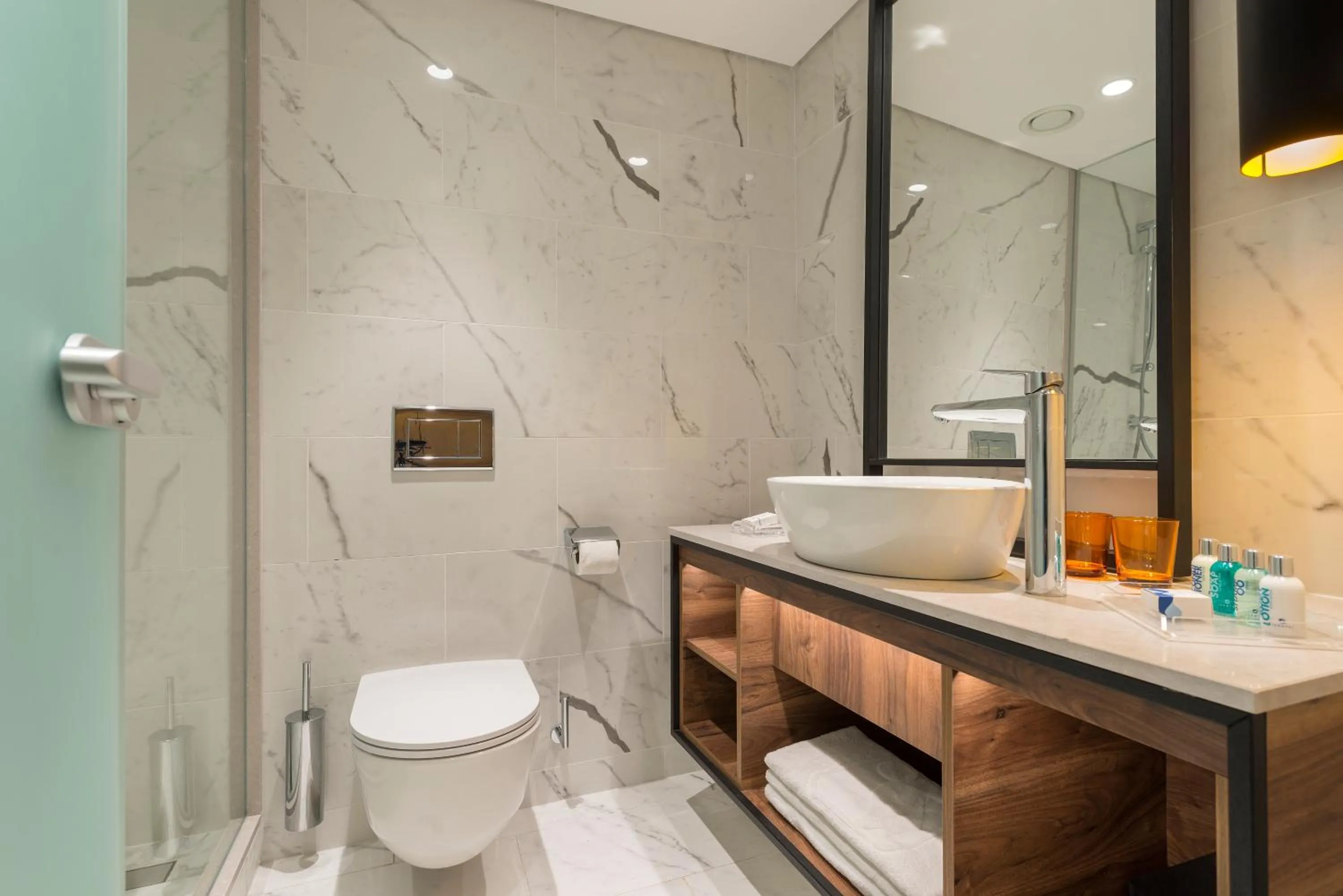 Bathroom in Nevo by Isrotel Collection