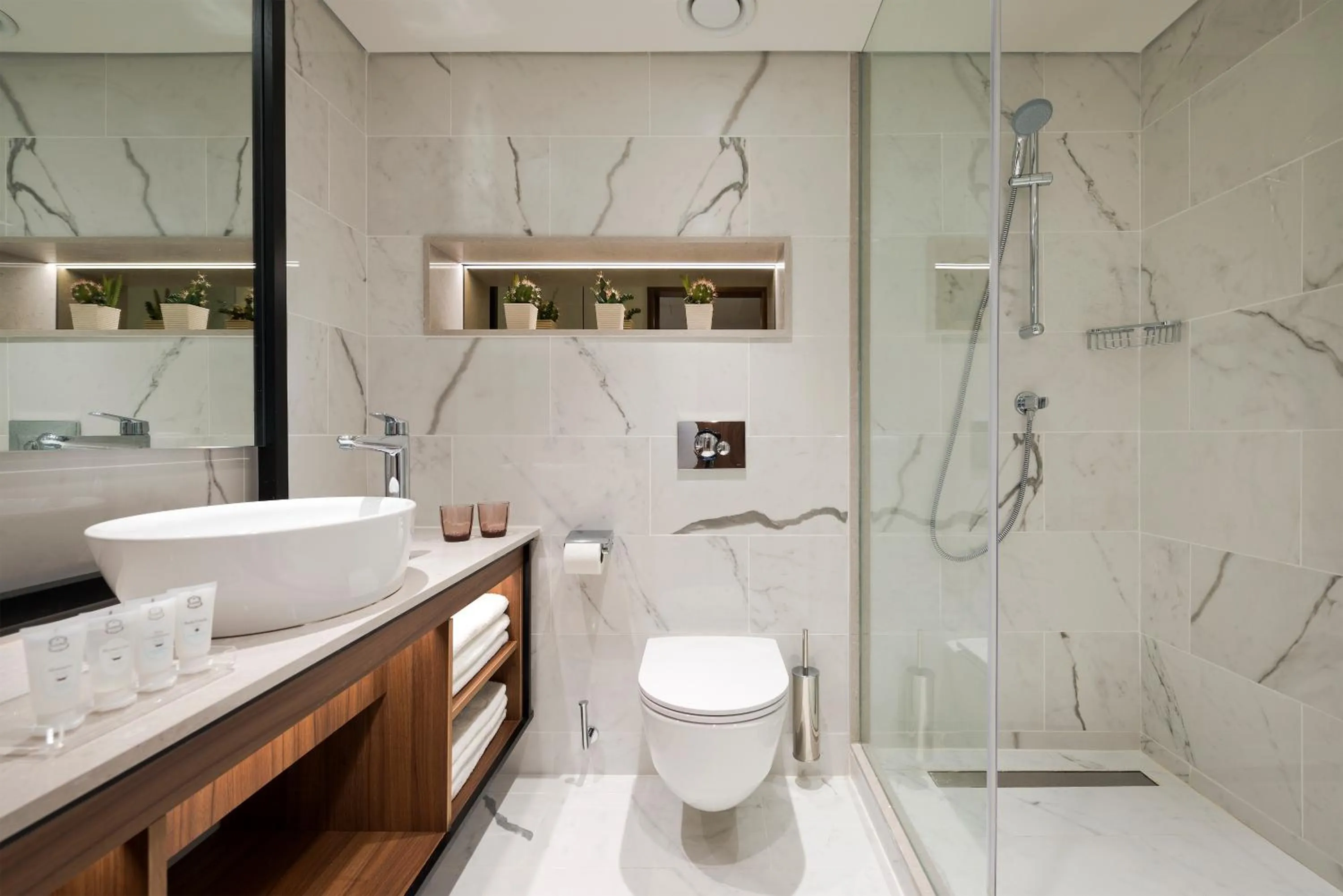 Bathroom in Nevo by Isrotel Collection