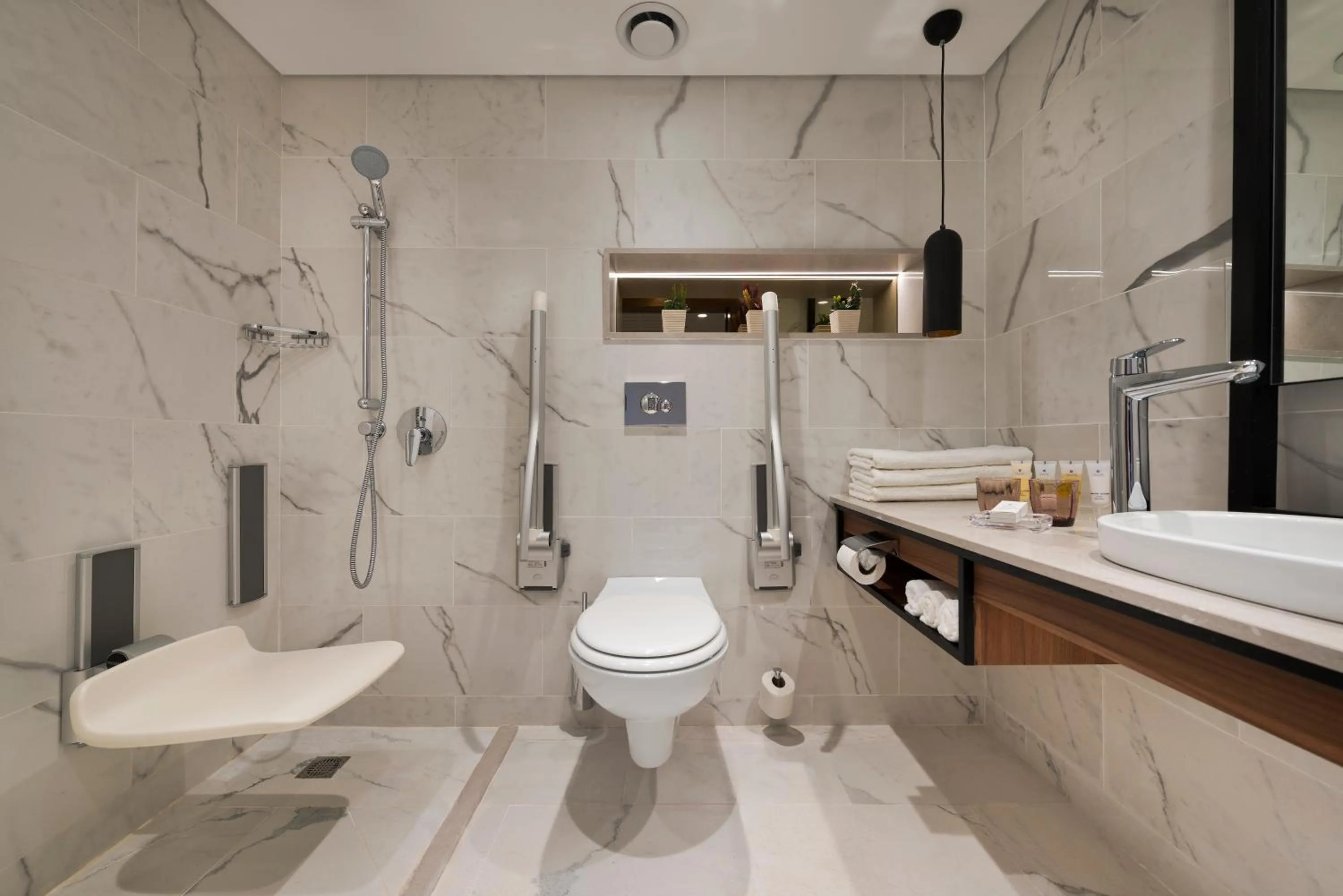Bathroom in Nevo by Isrotel Collection