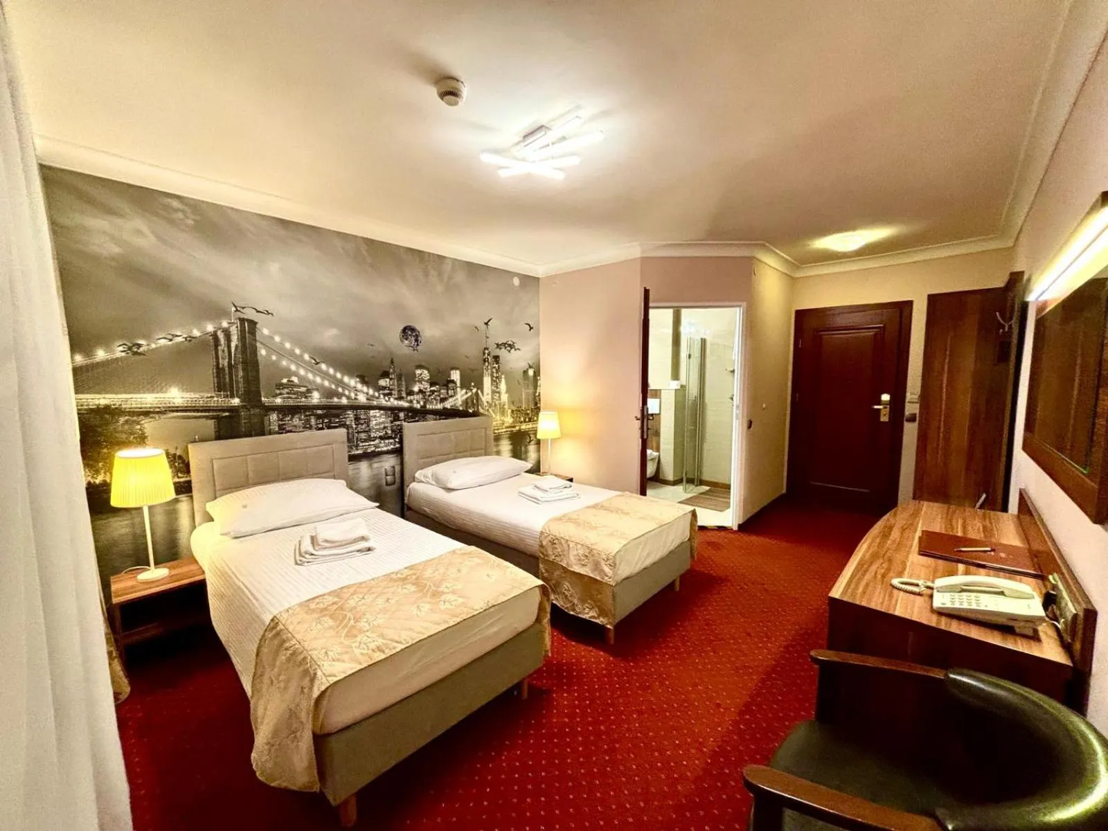 Bed in Cumulus Hotel