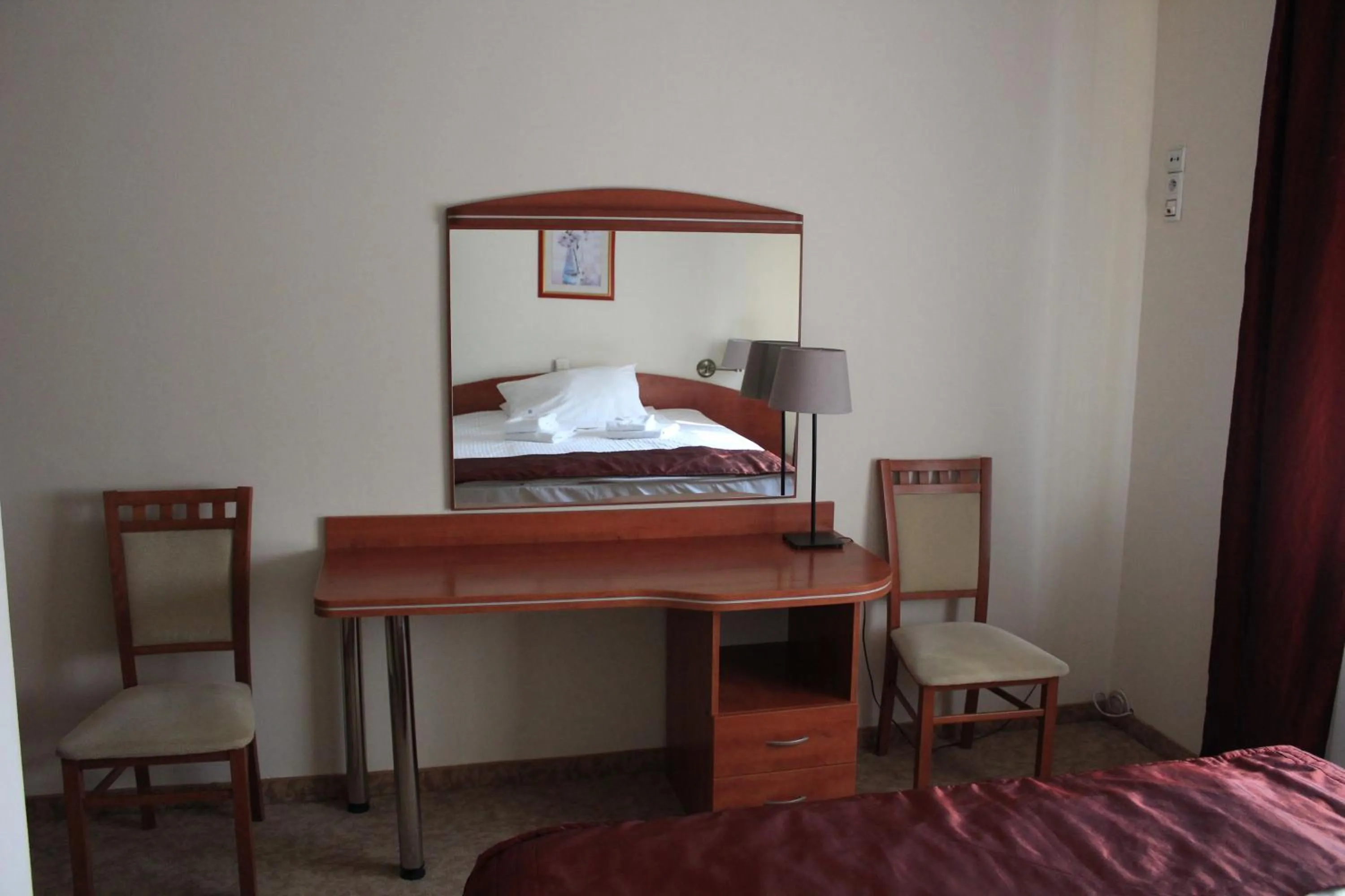 Bed in Cumulus Hotel