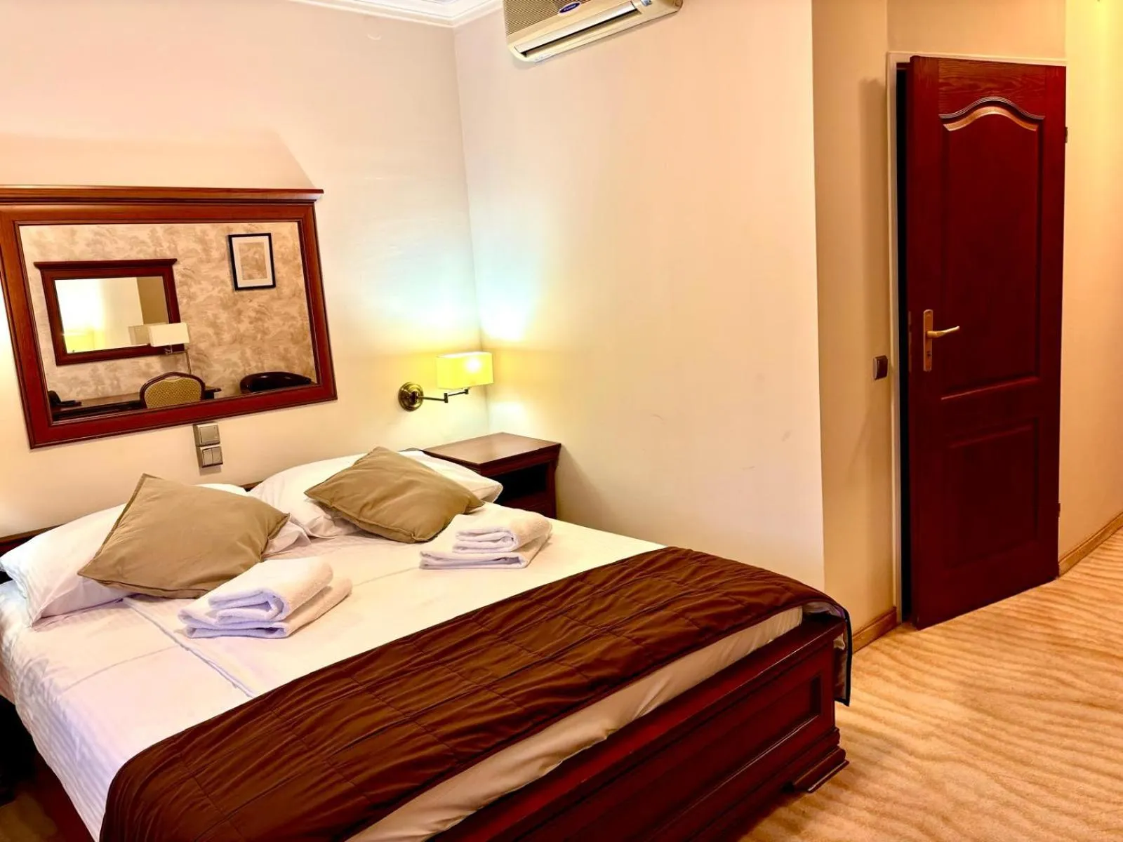 Bed in Cumulus Hotel