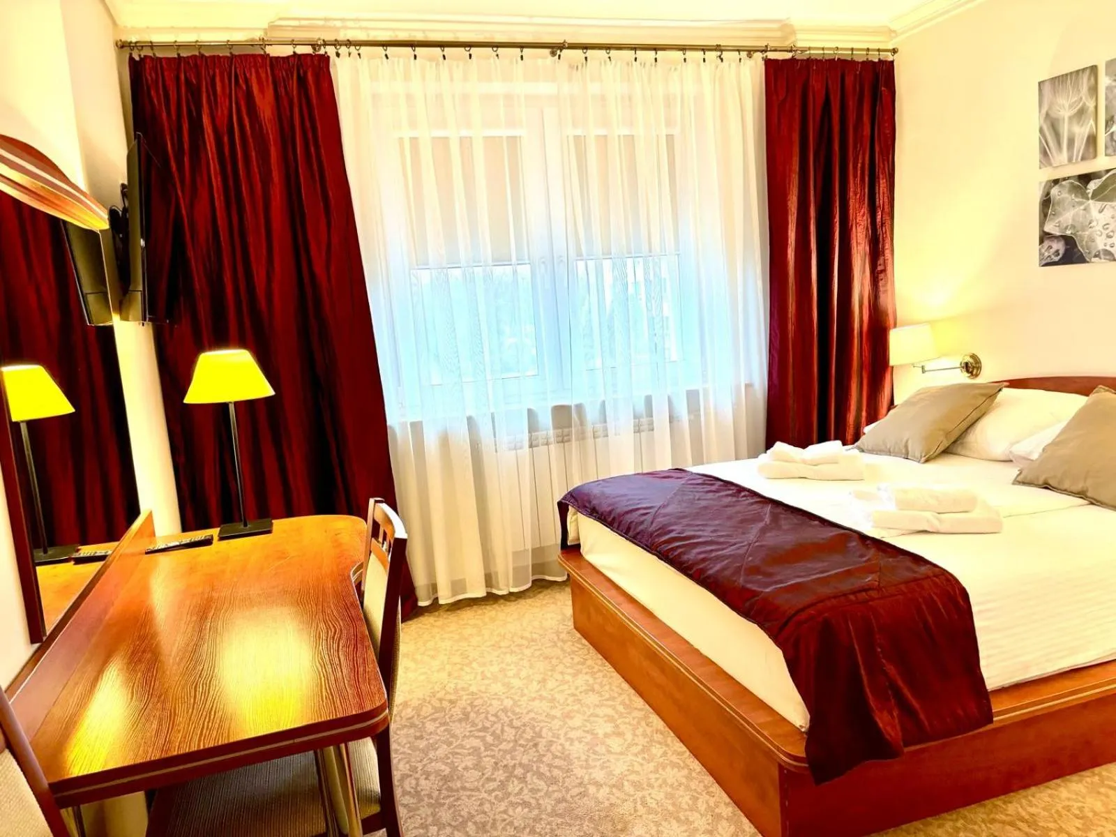 Bed in Cumulus Hotel