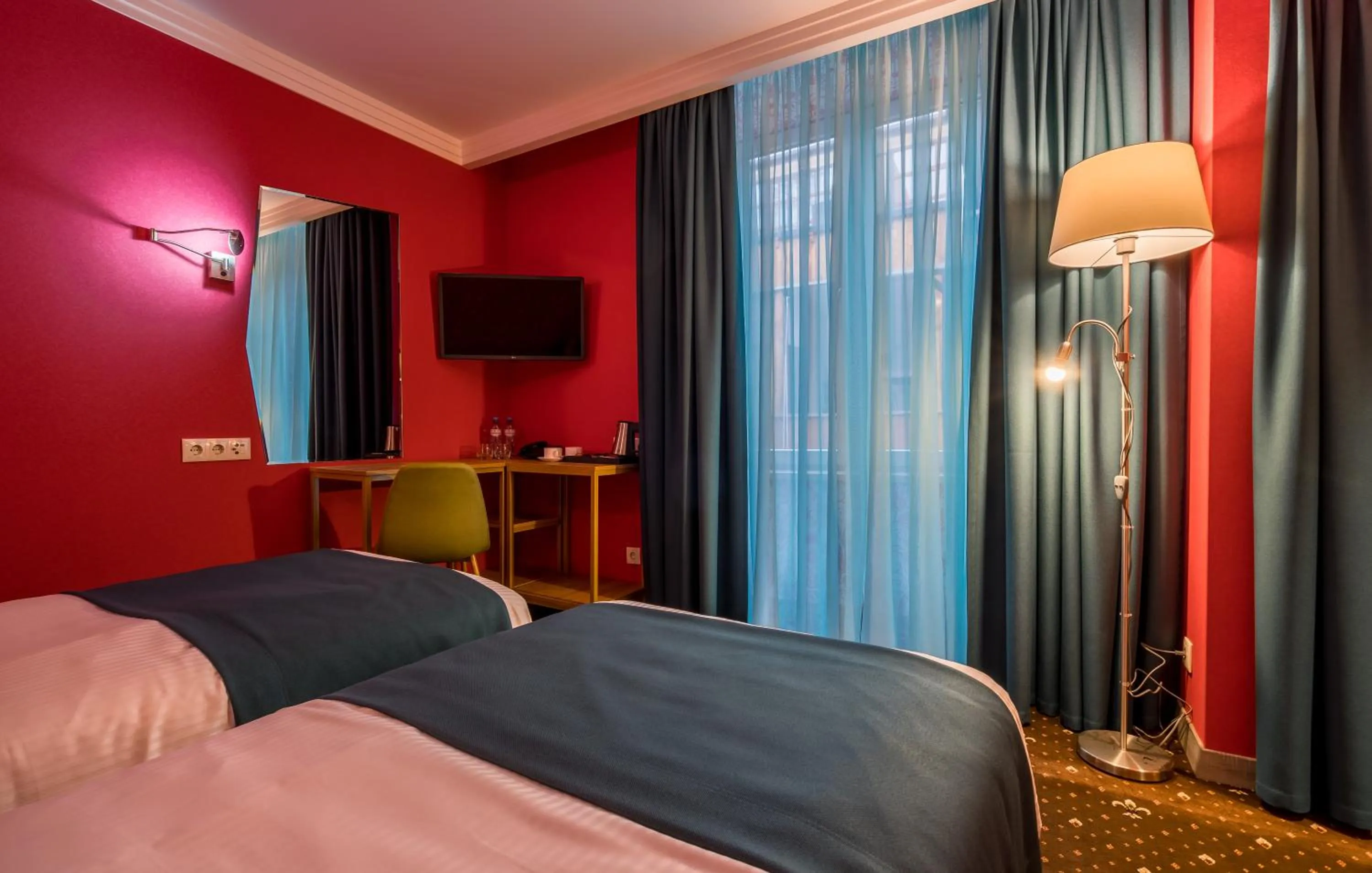 Bed in Gladius Inn Boutique Hotel by DNT Group