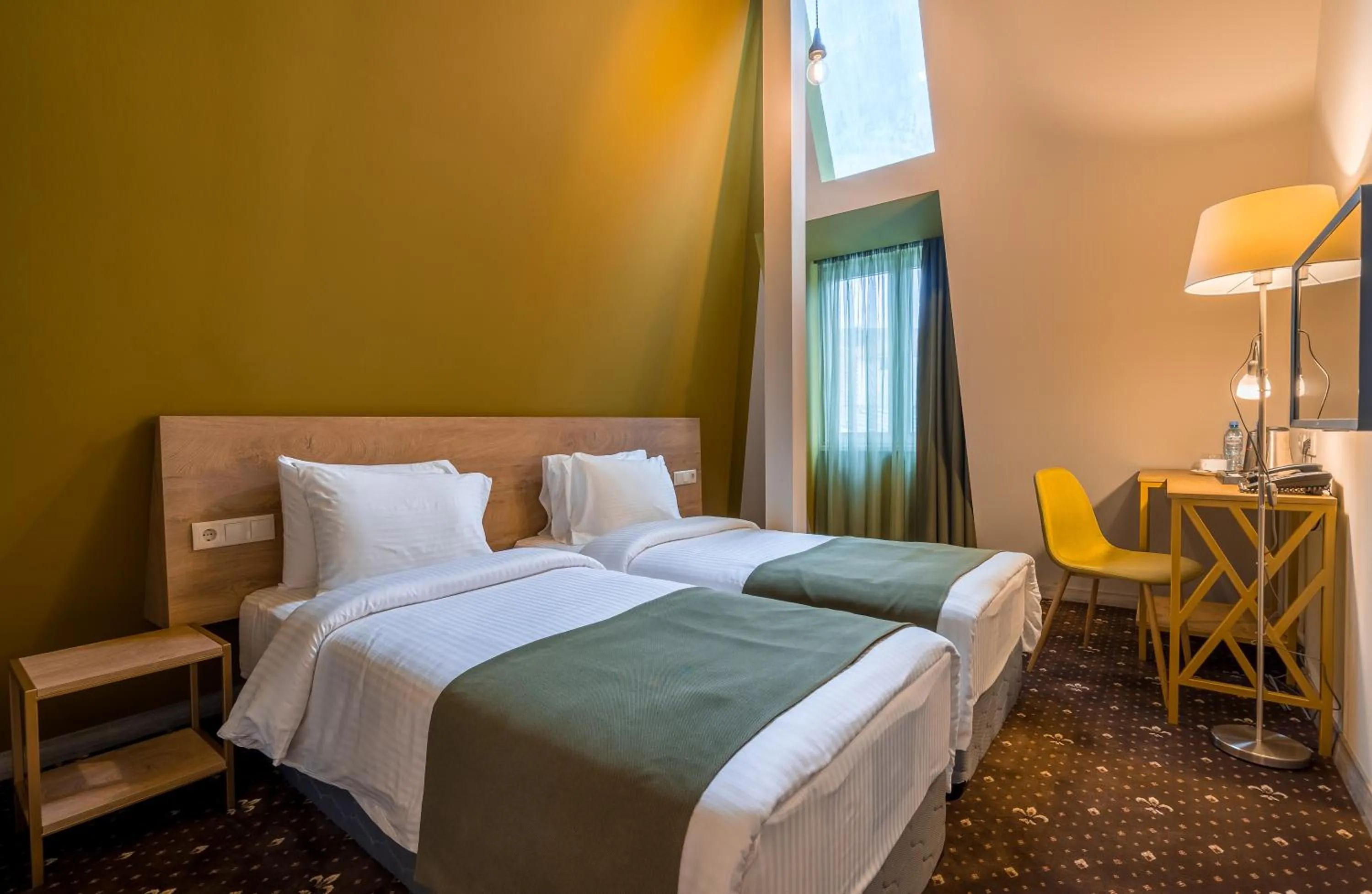 Bed in Gladius Inn Boutique Hotel by DNT Group