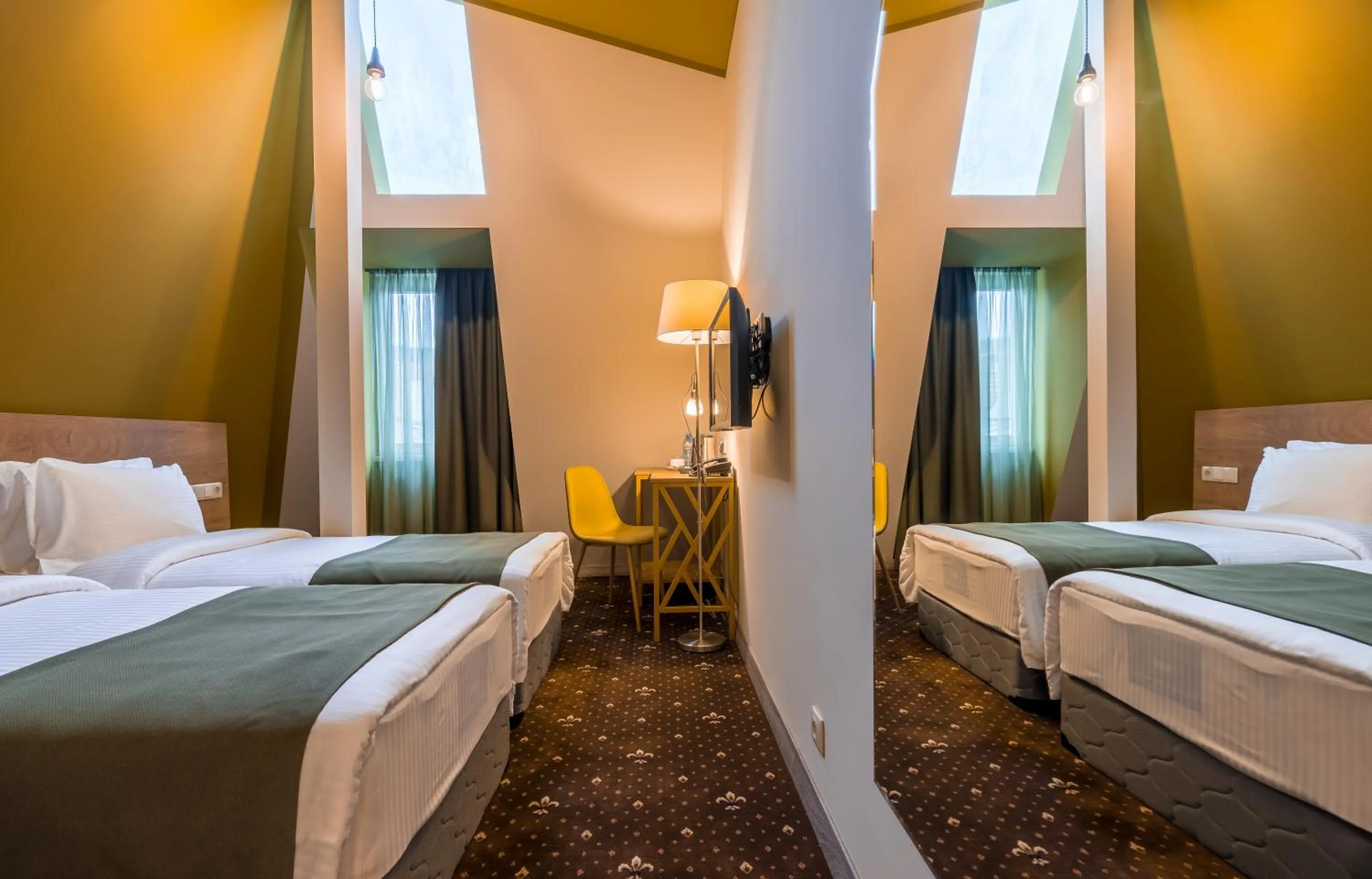 Bed in Gladius Inn Boutique Hotel by DNT Group