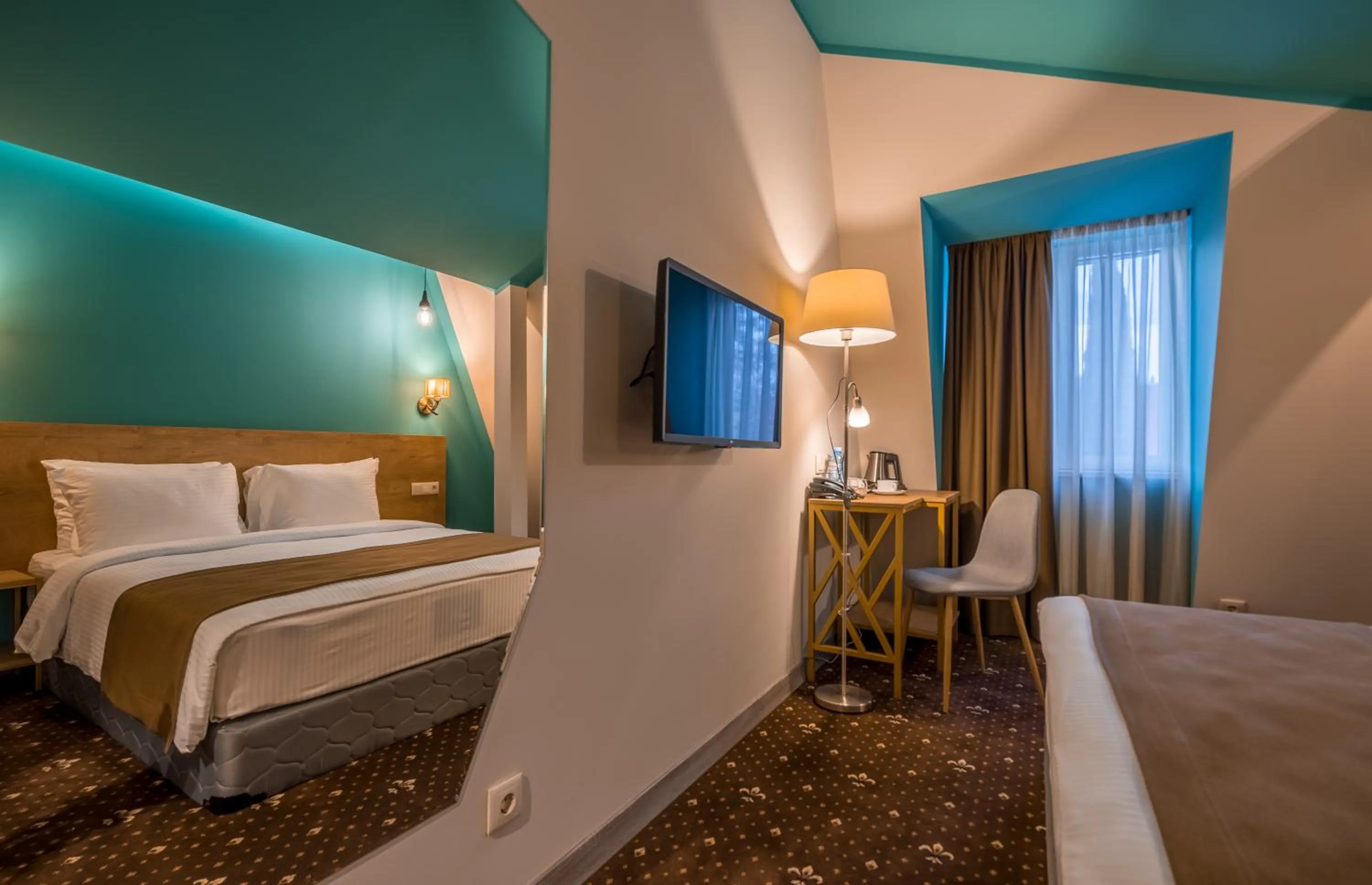 Bed in Gladius Inn Boutique Hotel by DNT Group