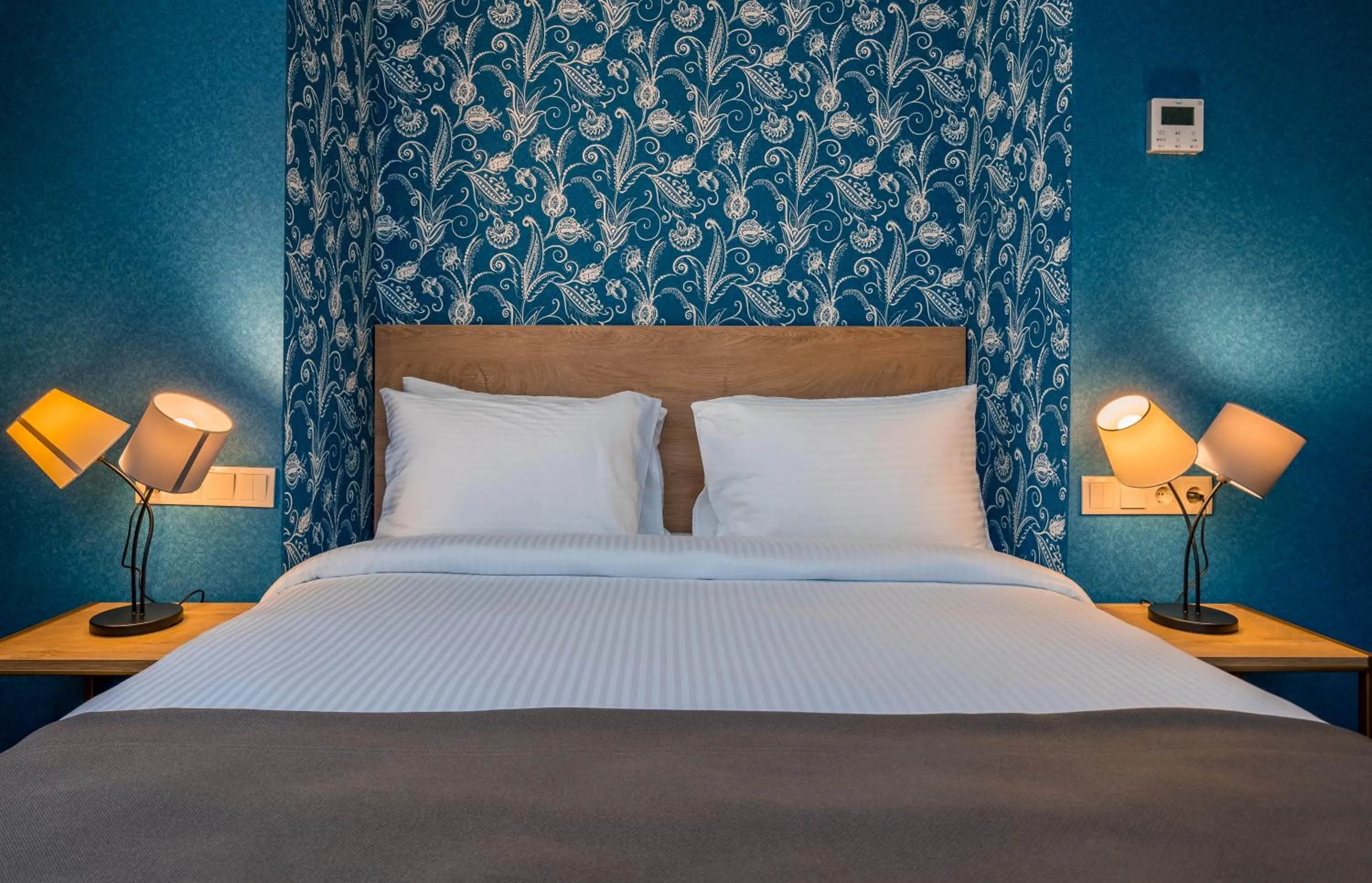 Bed in Gladius Inn Boutique Hotel by DNT Group