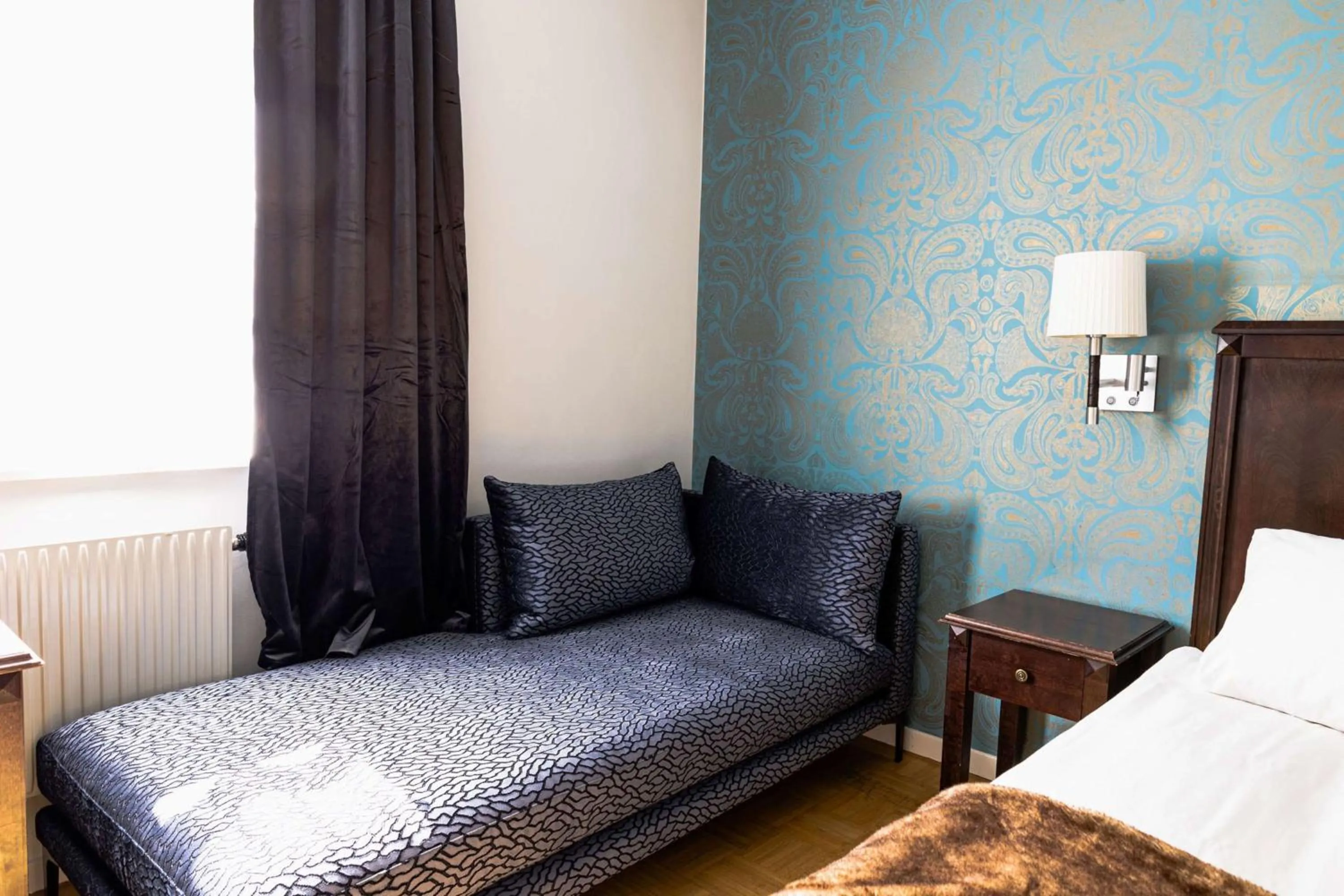 Bedroom, Bed in Vimmerby Stadshotell, WorldHotels Crafted