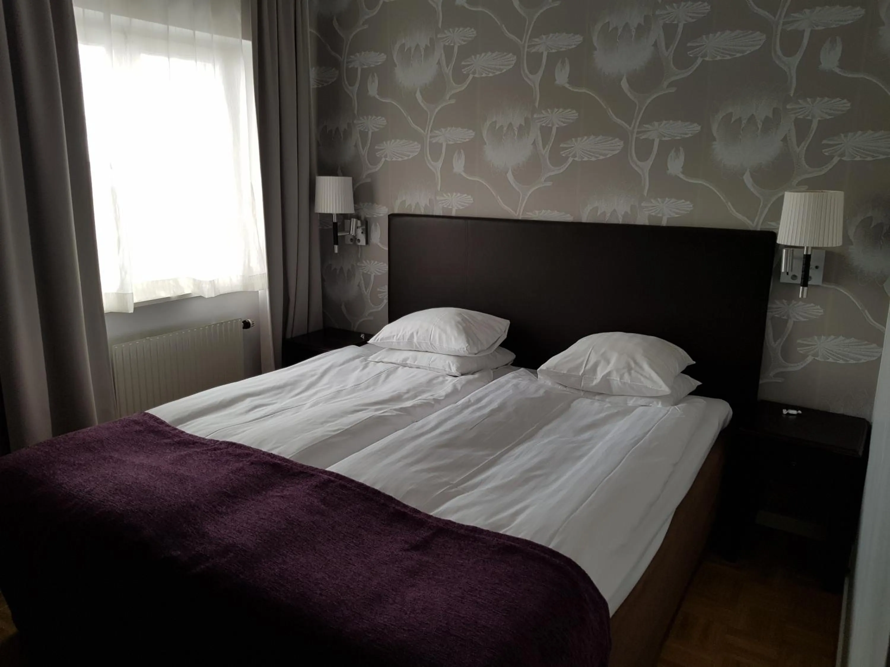 Bed in Vimmerby Stadshotell, WorldHotels Crafted