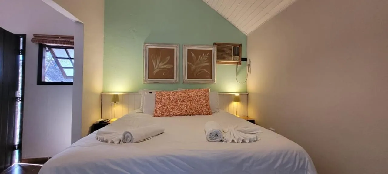 Photo of the whole room, Bed in Pousada Vila Santa Barbara