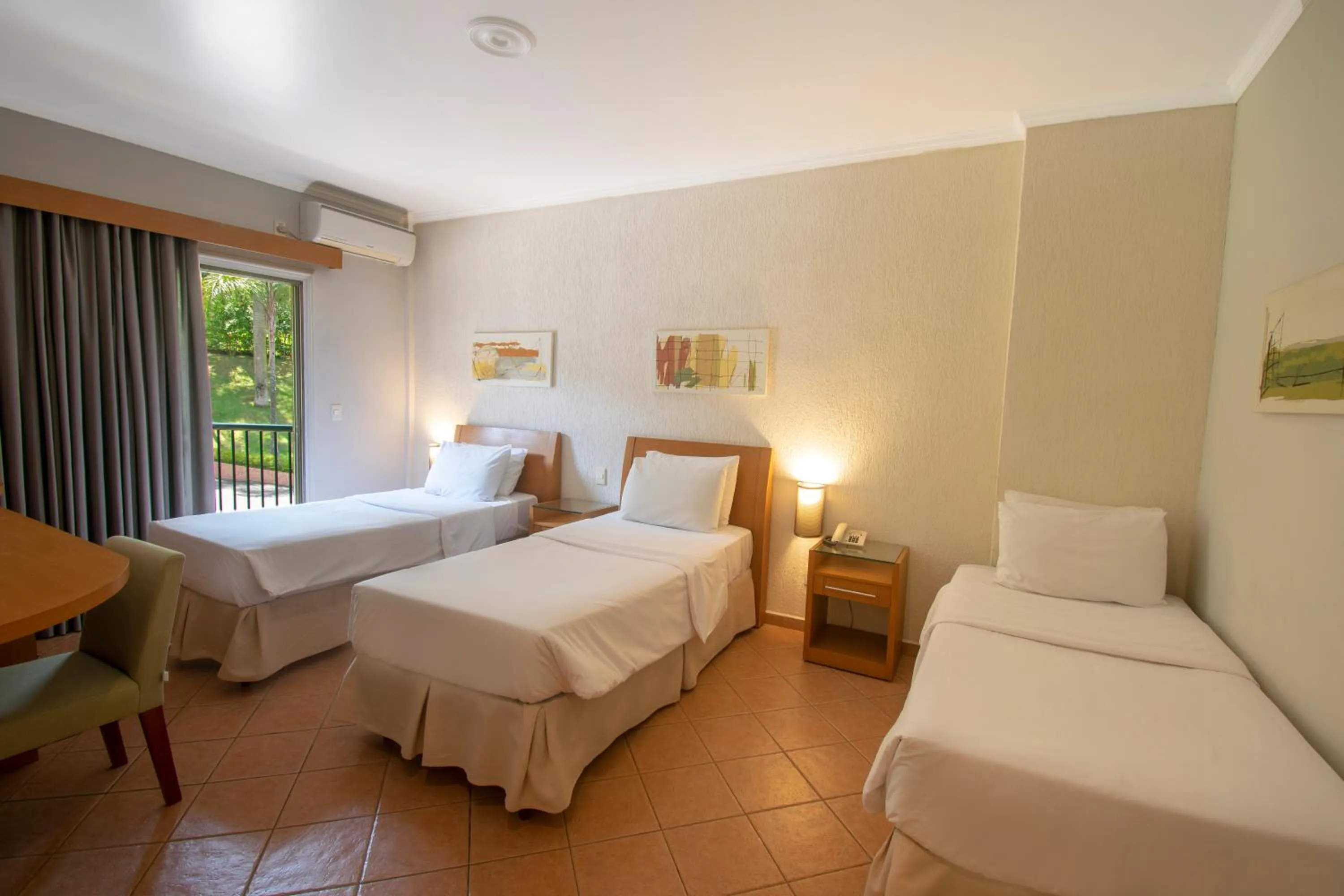 Bed in Oscar Inn Eco Resort