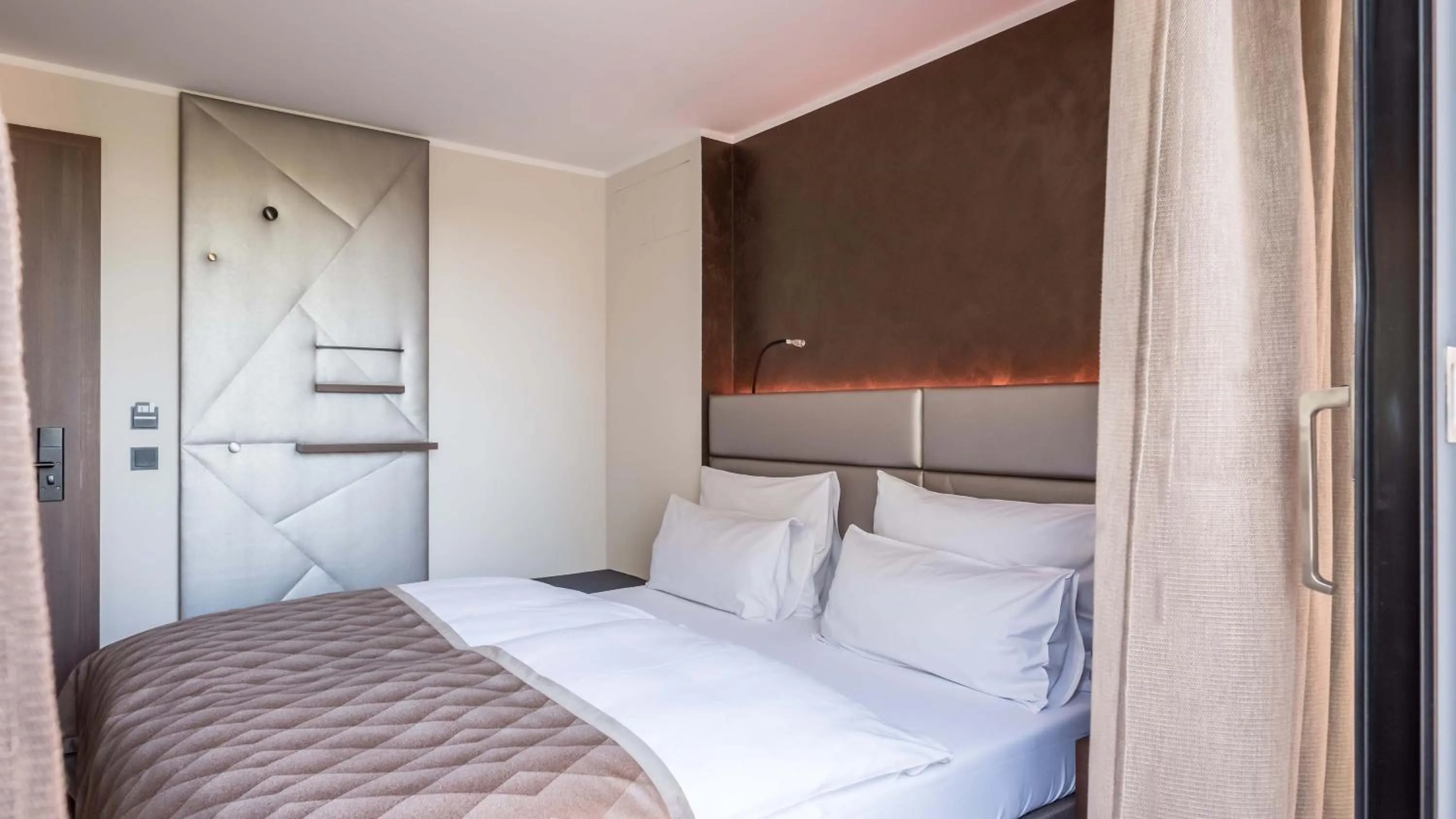 Bed in Innspire Hotel