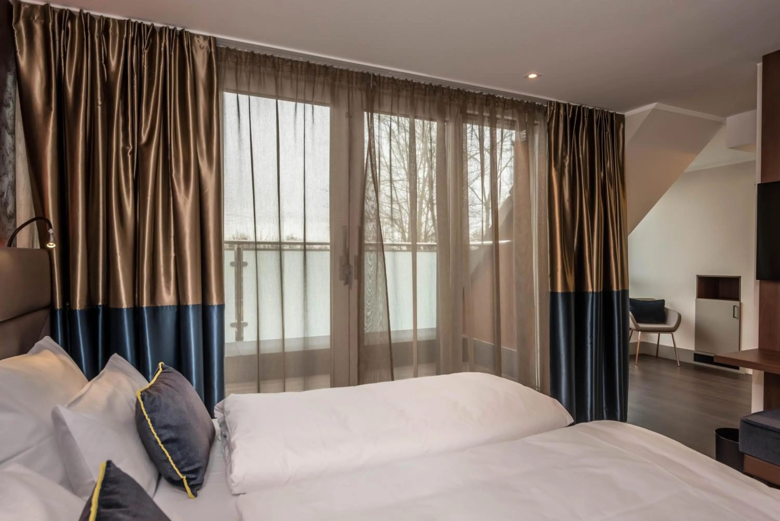 Bed in Innspire Hotel