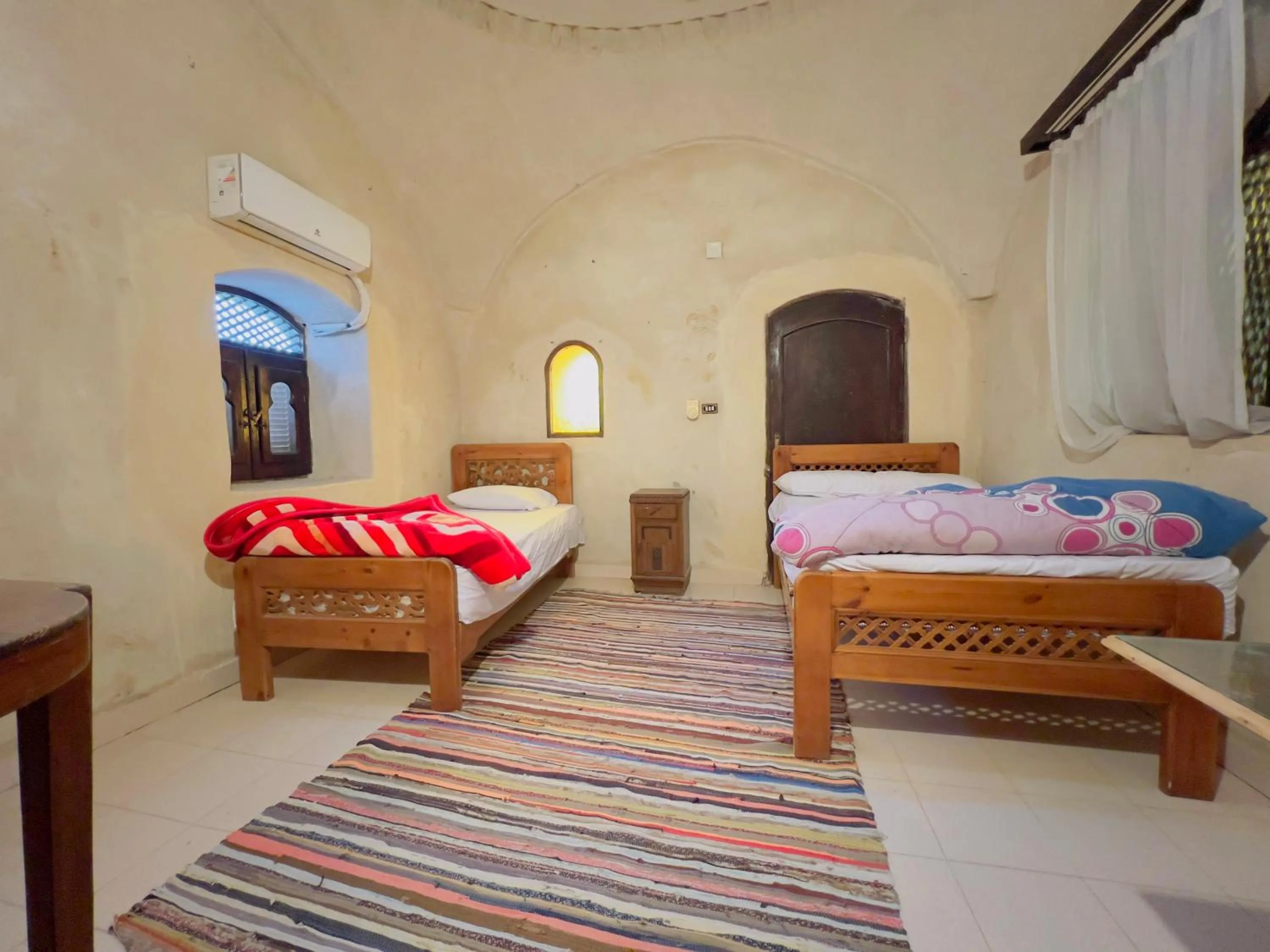 Bed in Zad El Mosafer Guest House