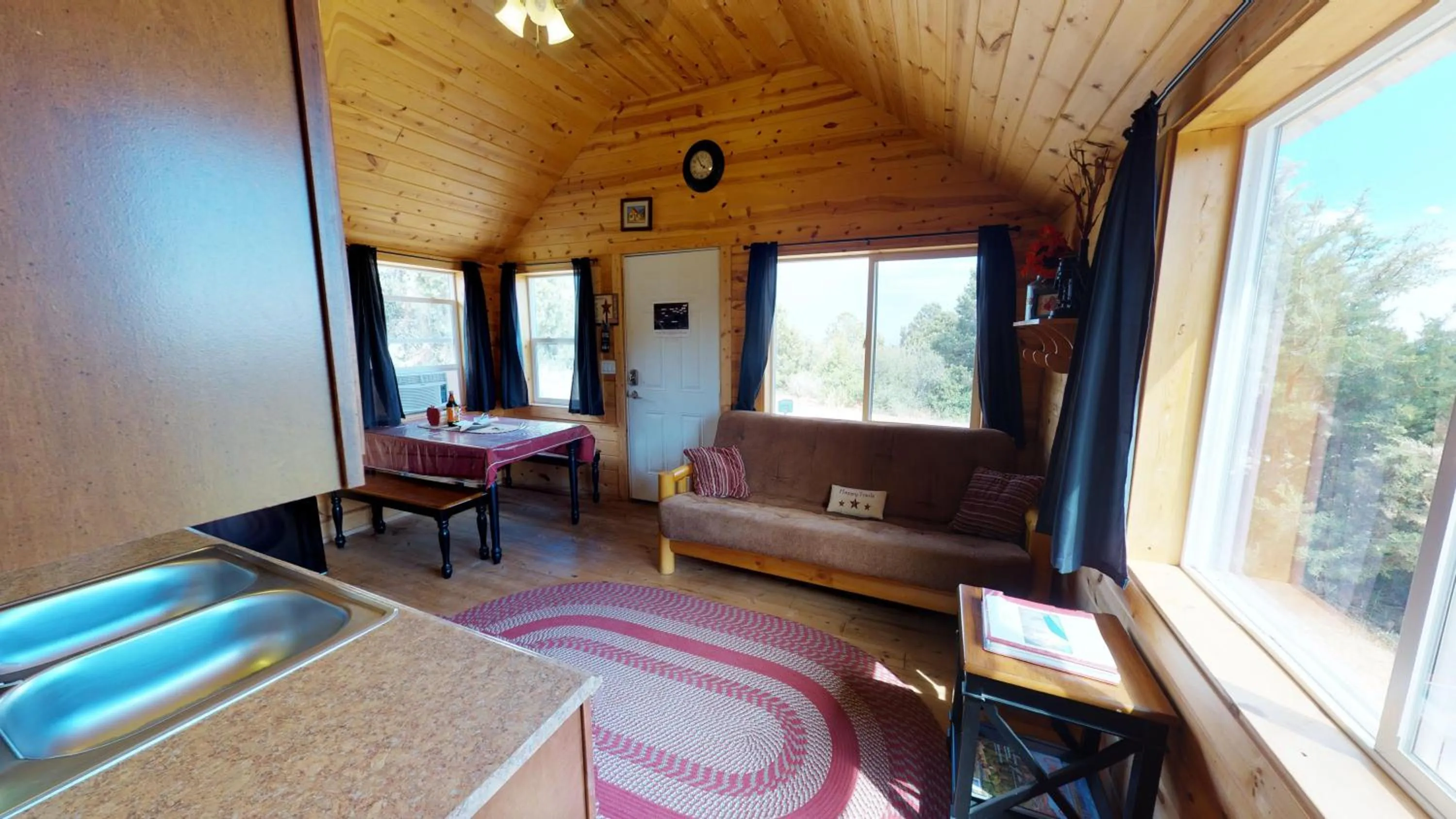 Living room in White Pine Cabin by Canyonlands Lodging