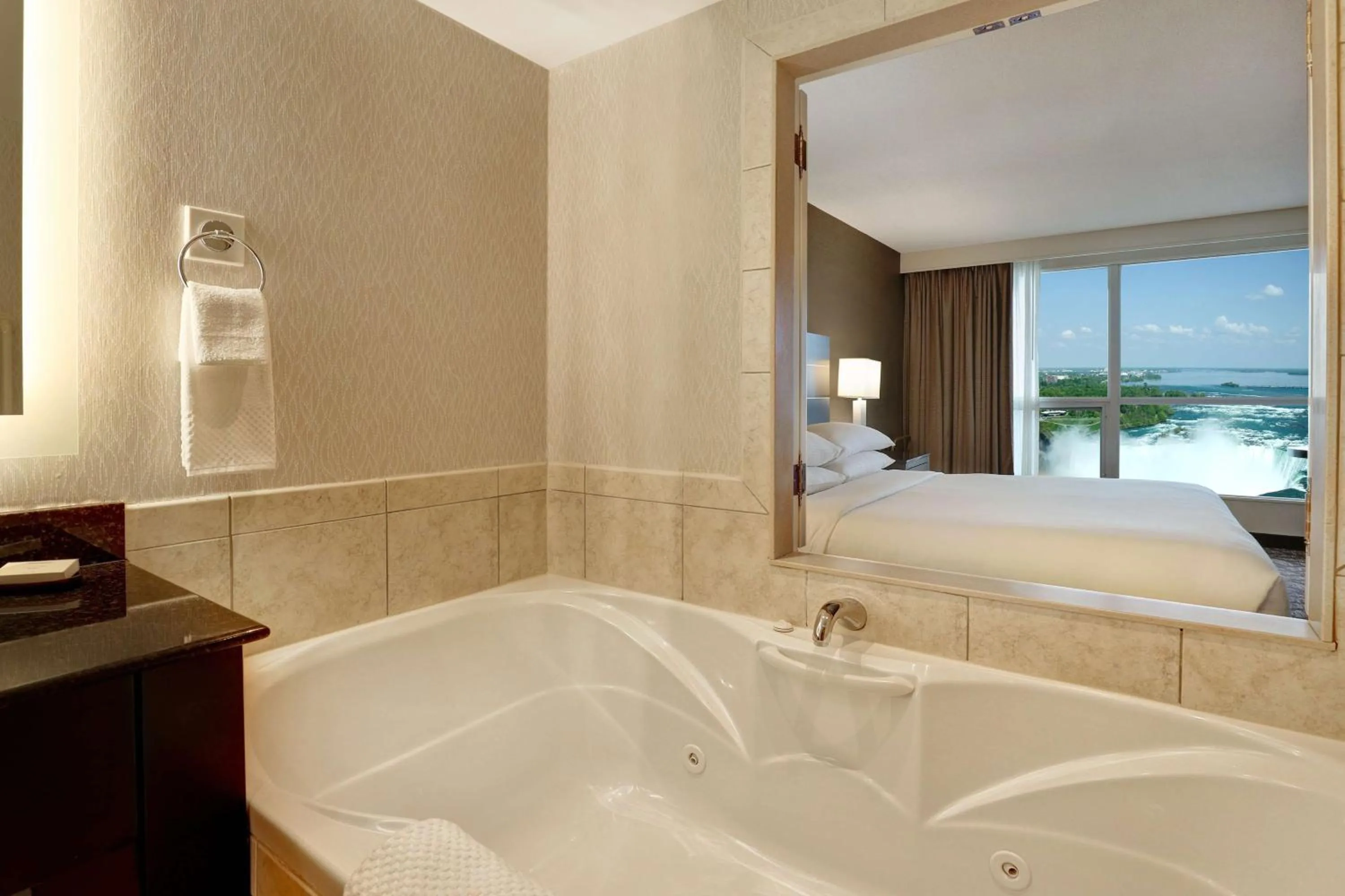 Bathroom, Bed in Embassy Suites by Hilton Niagara Falls/ Fallsview