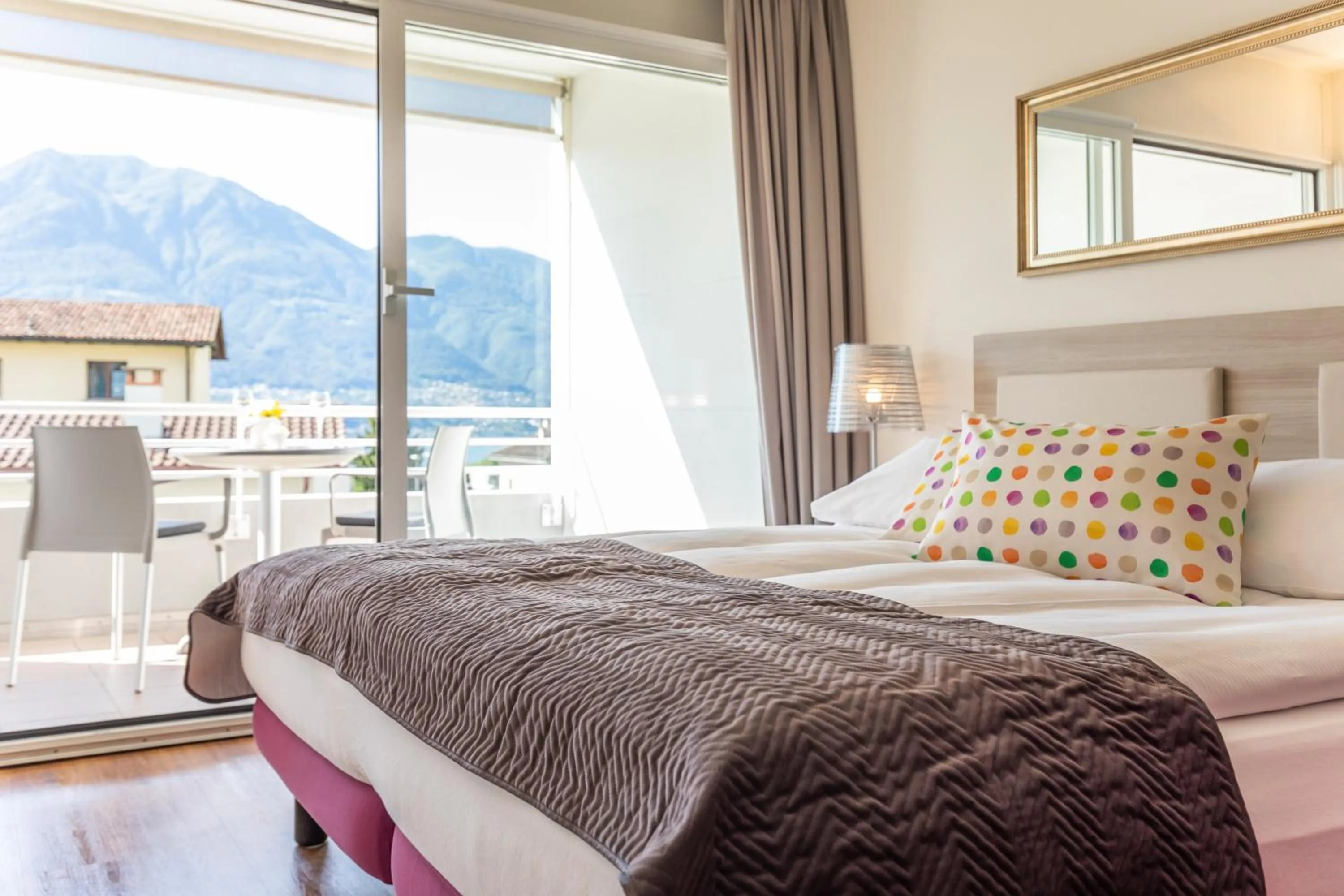 Photo of the whole room, Bed in Smart-HOTEL MINUSIO, a Swiss Quality Hotel