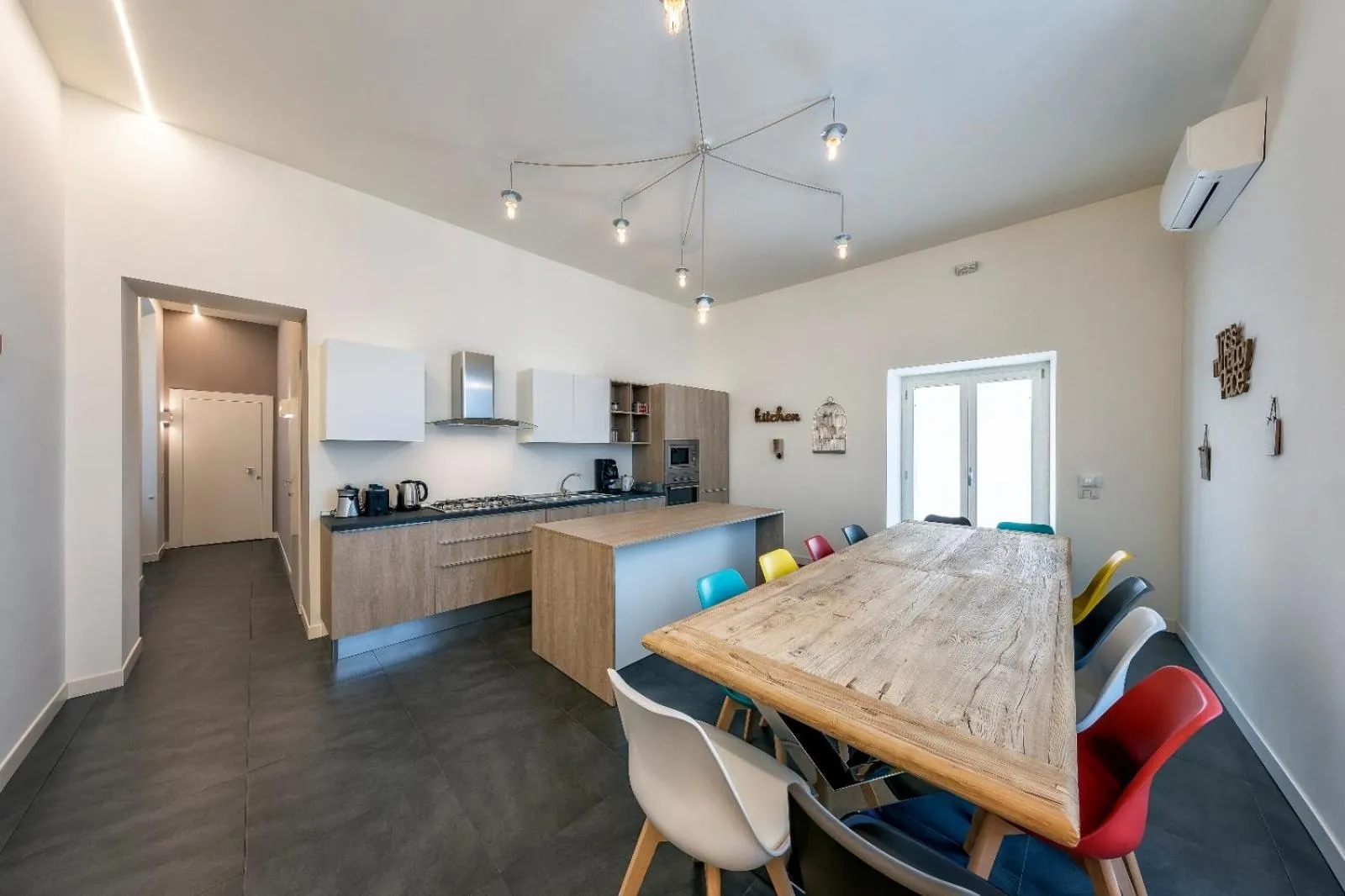 Kitchen or kitchenette in Napoli Squares Suites