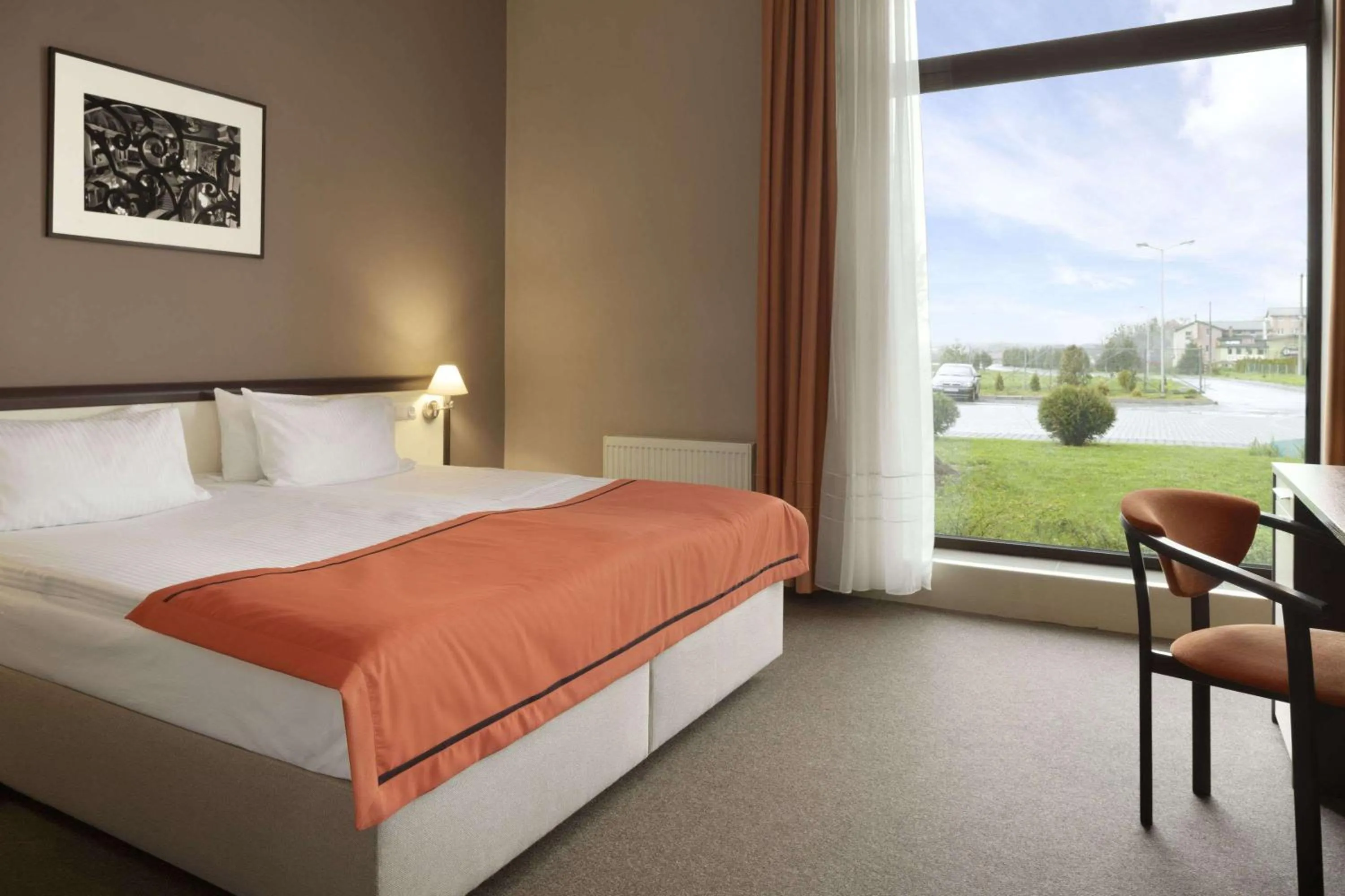 Photo of the whole room, Bed in Lviv Ramada Hotel