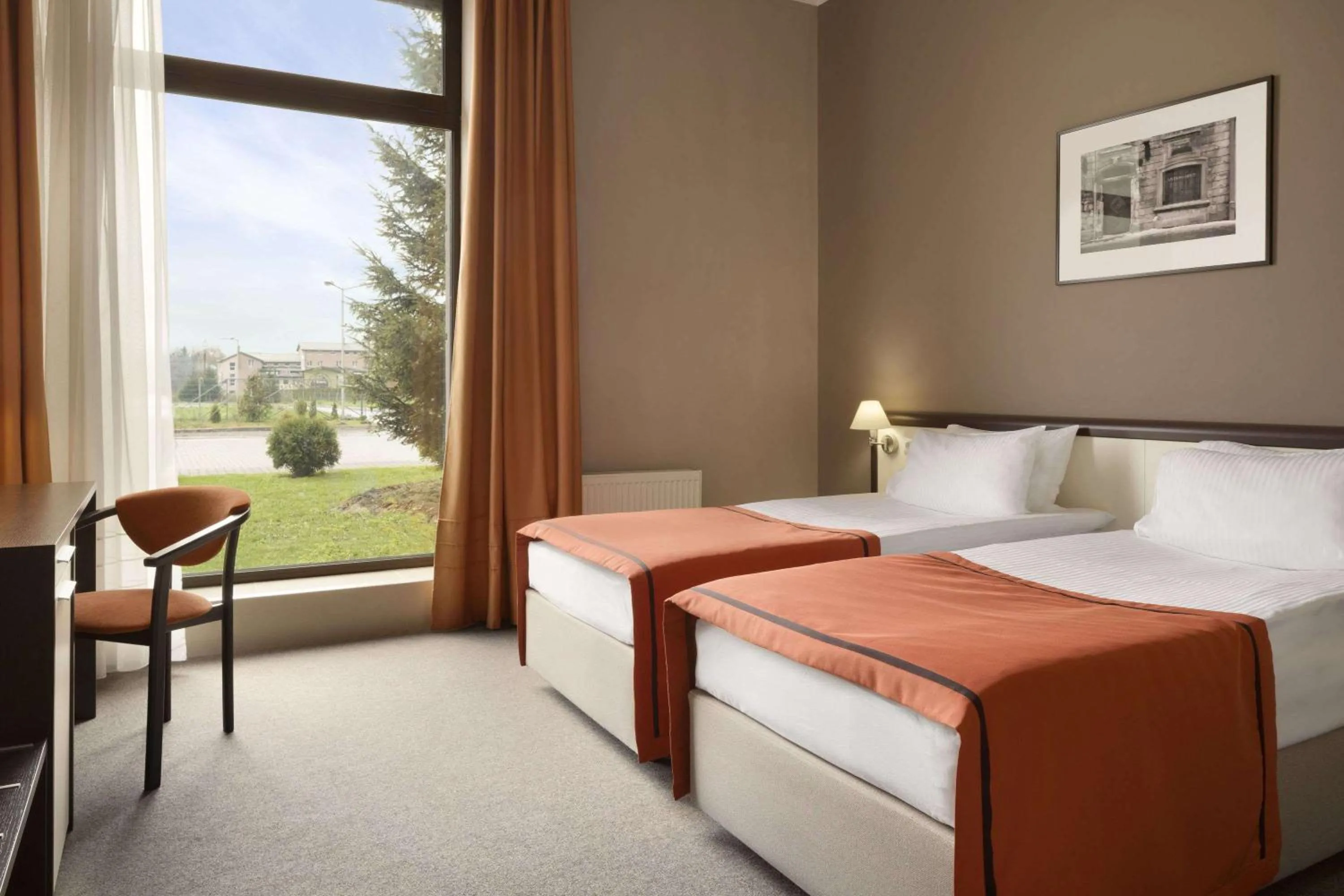 Photo of the whole room, Bed in Lviv Ramada Hotel