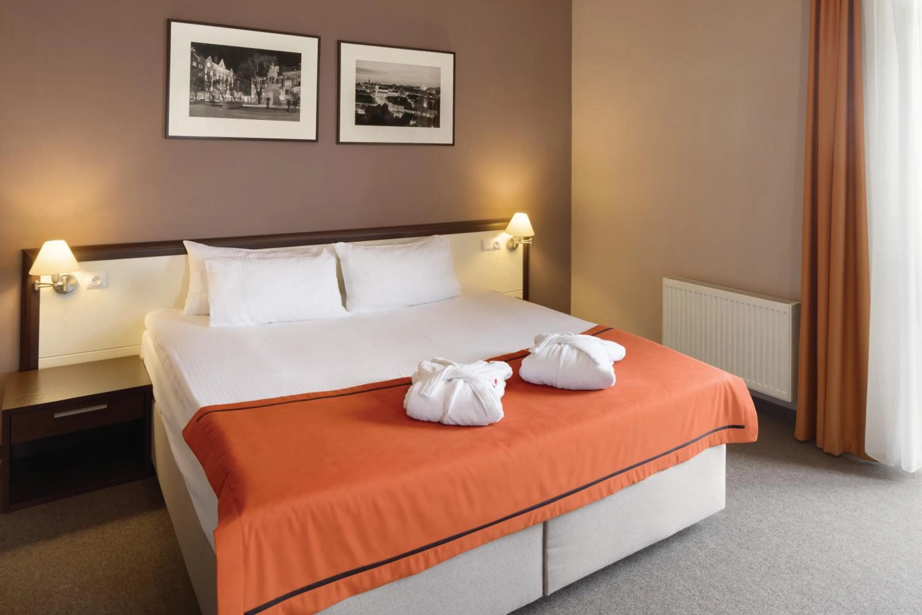 Photo of the whole room, Bed in Lviv Ramada Hotel