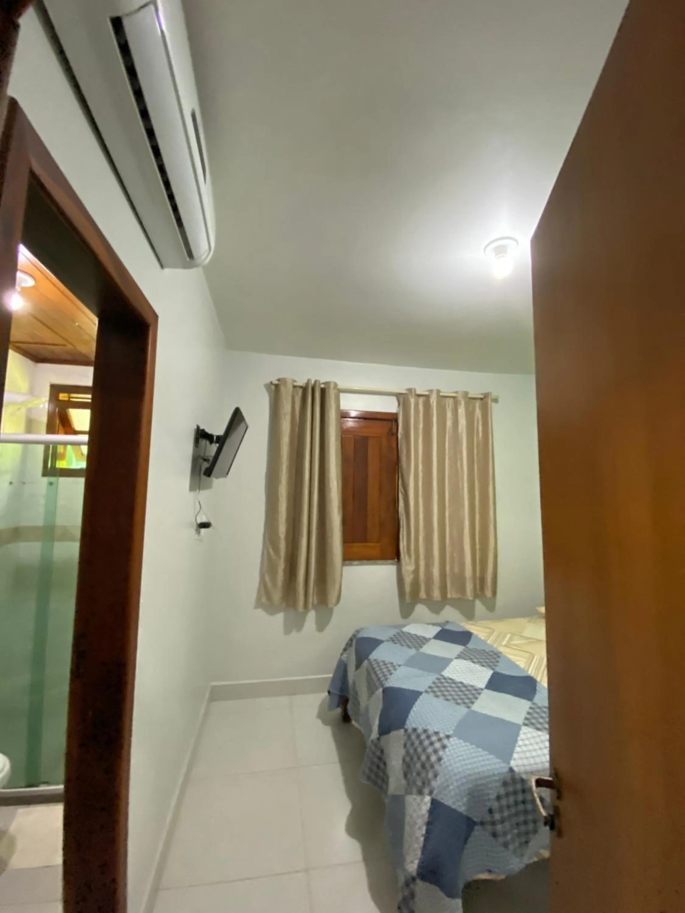 Photo of the whole room, Bed in Pousada Lagoa Flat