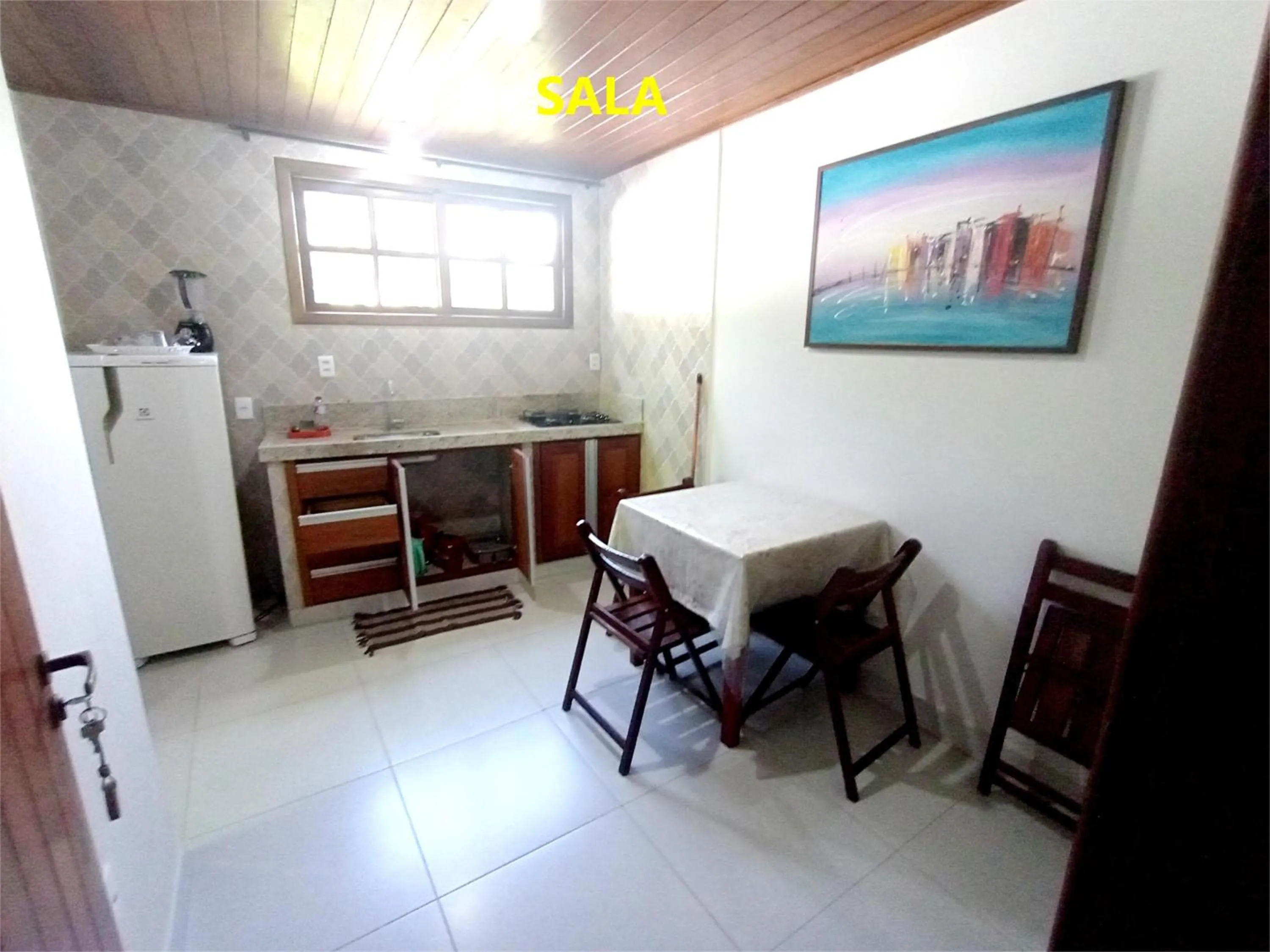 Kitchen or kitchenette in Pousada Lagoa Flat