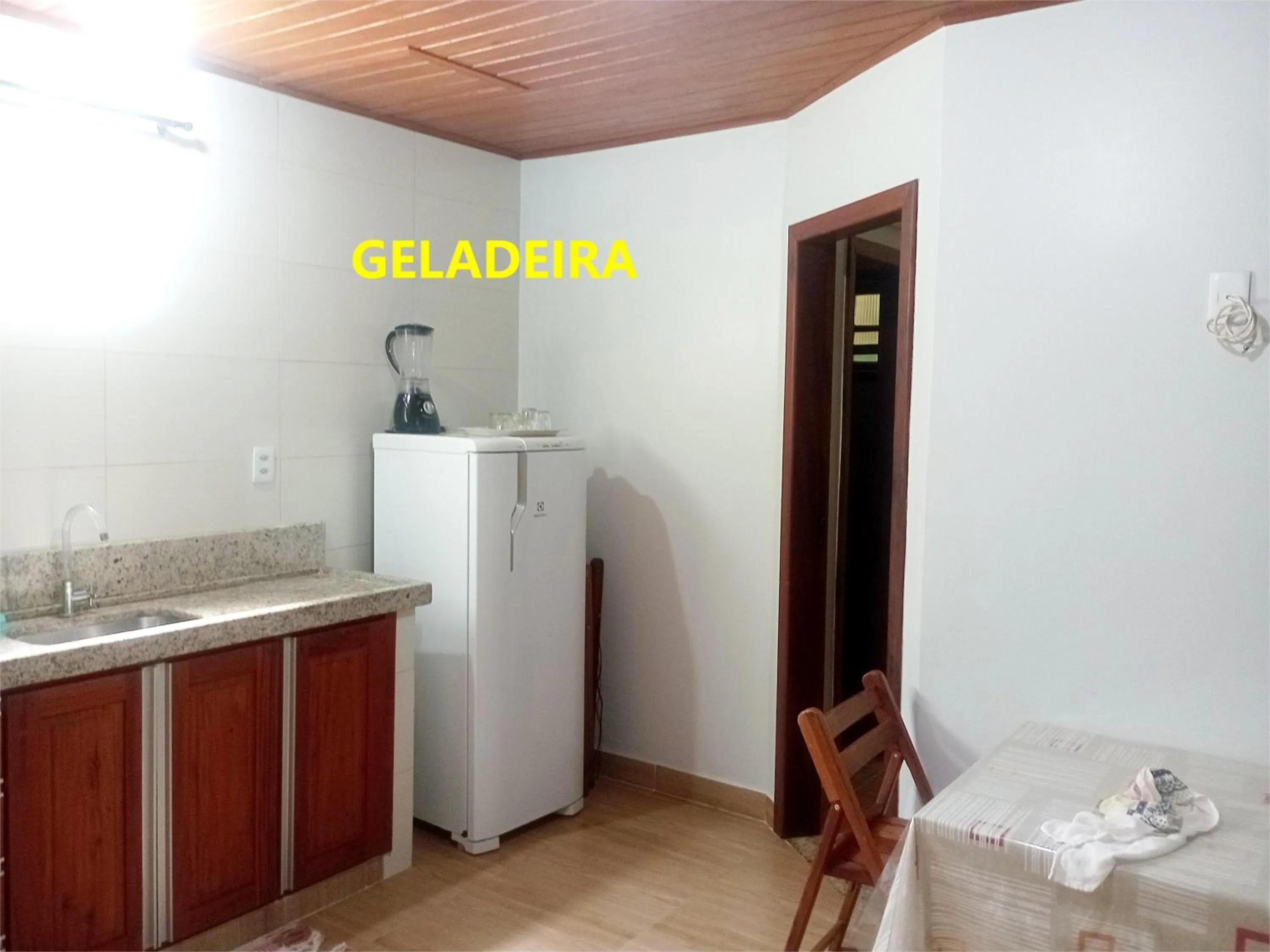 Kitchen or kitchenette in Pousada Lagoa Flat