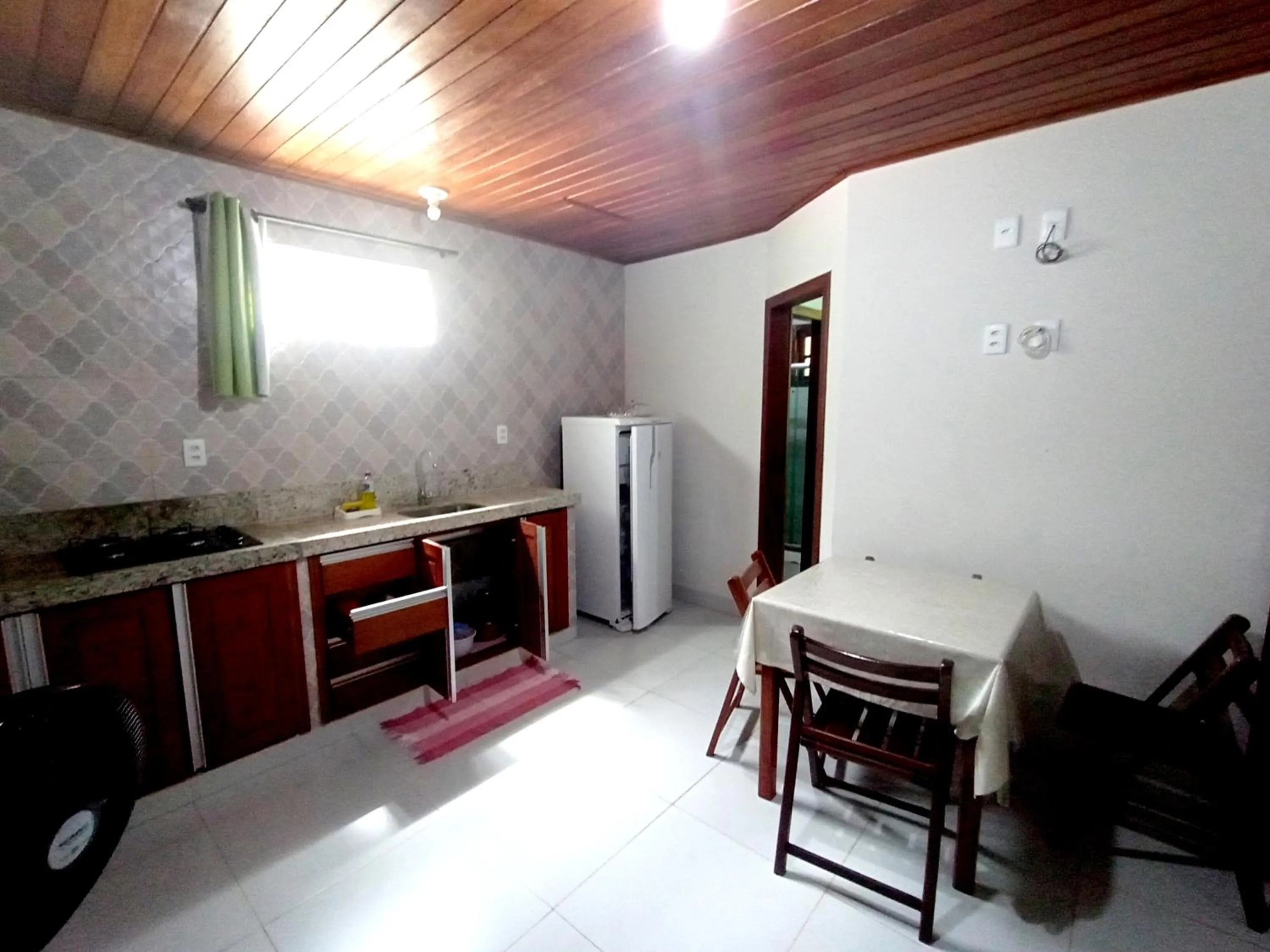 Kitchen or kitchenette in Pousada Lagoa Flat