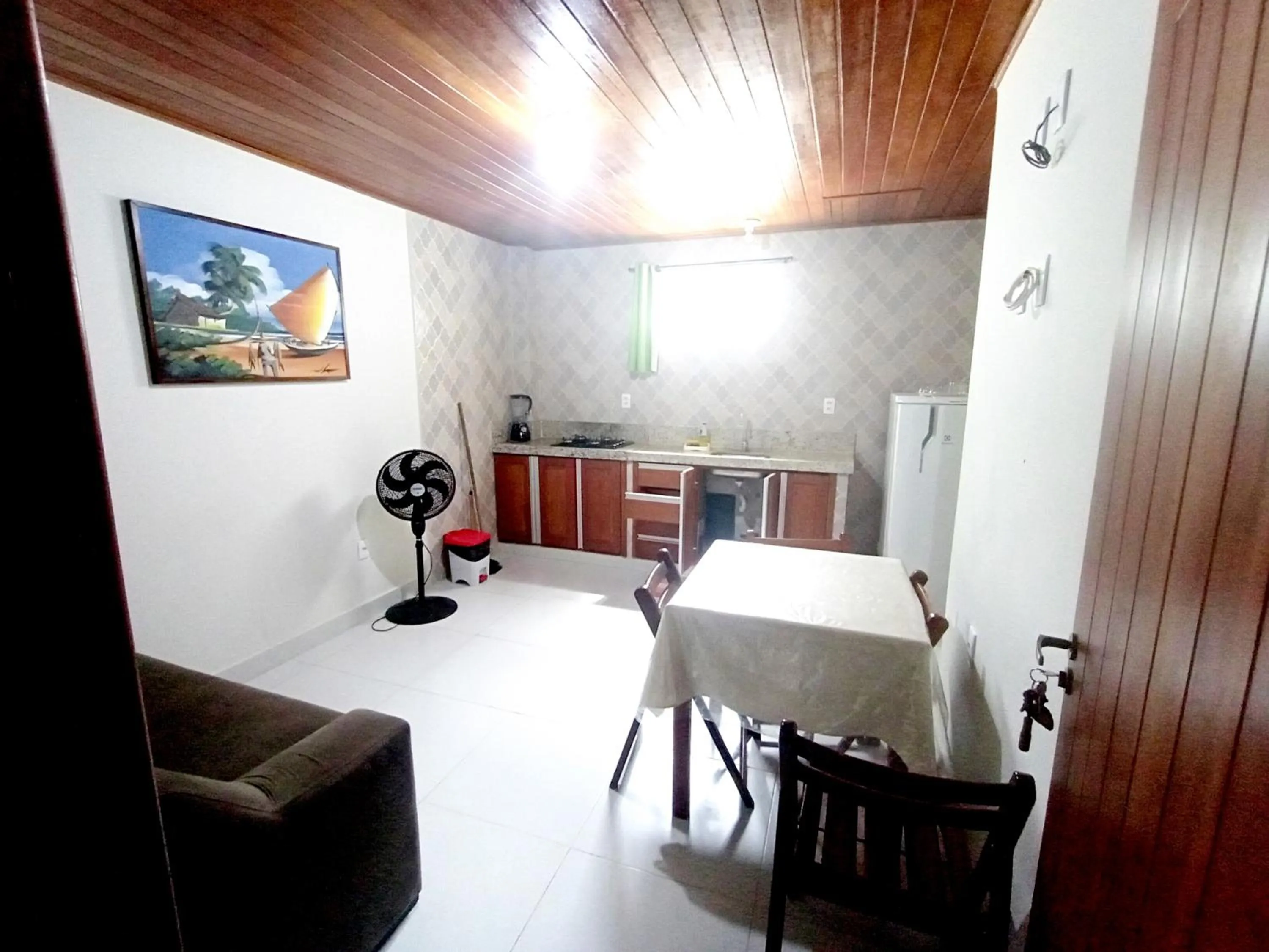 Kitchen or kitchenette in Pousada Lagoa Flat